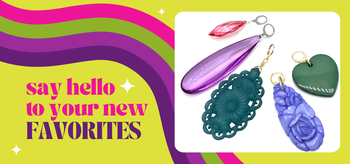 promotional image "say hello to your new favorites" with brightly colored charms