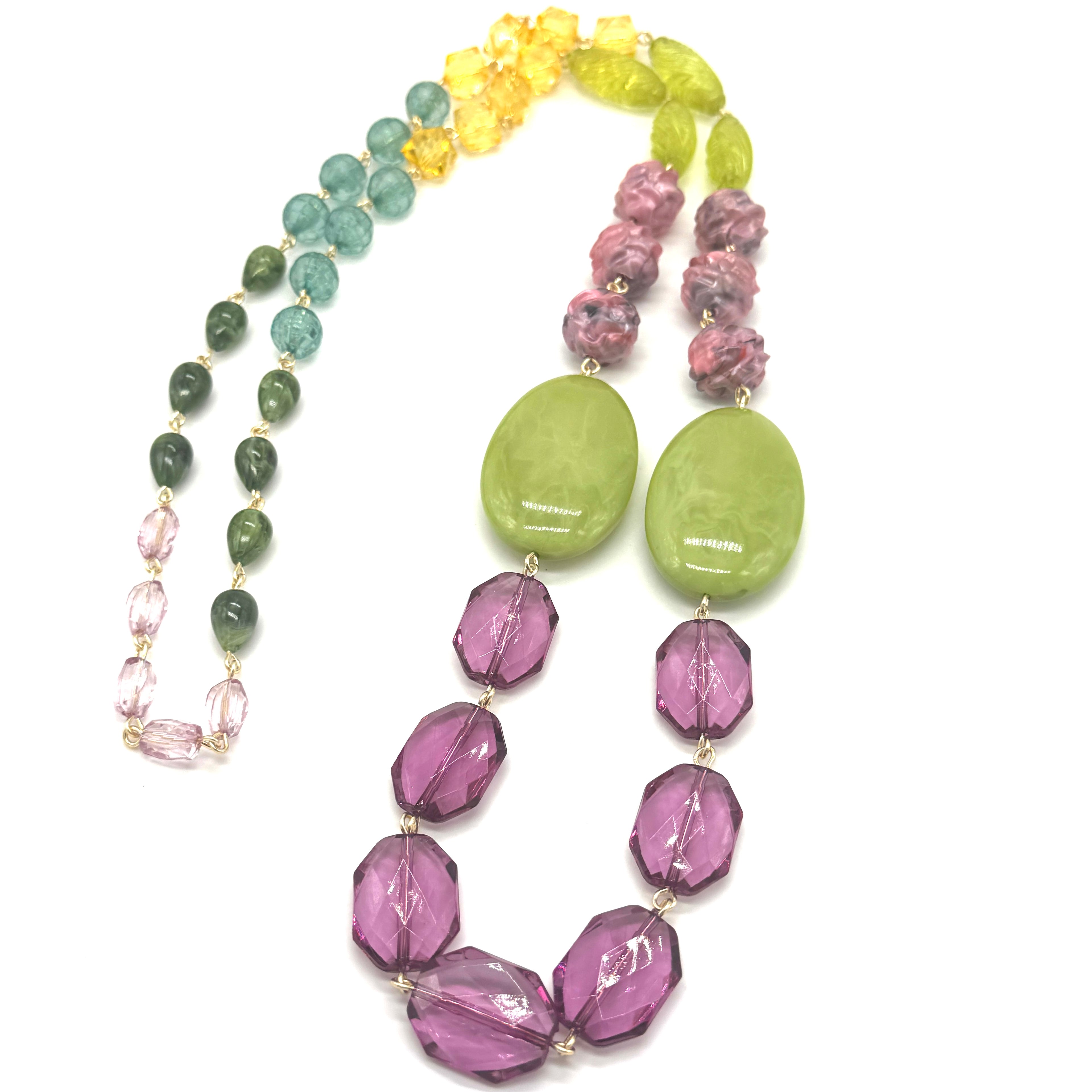 Necklace with multicolored beads on a white background