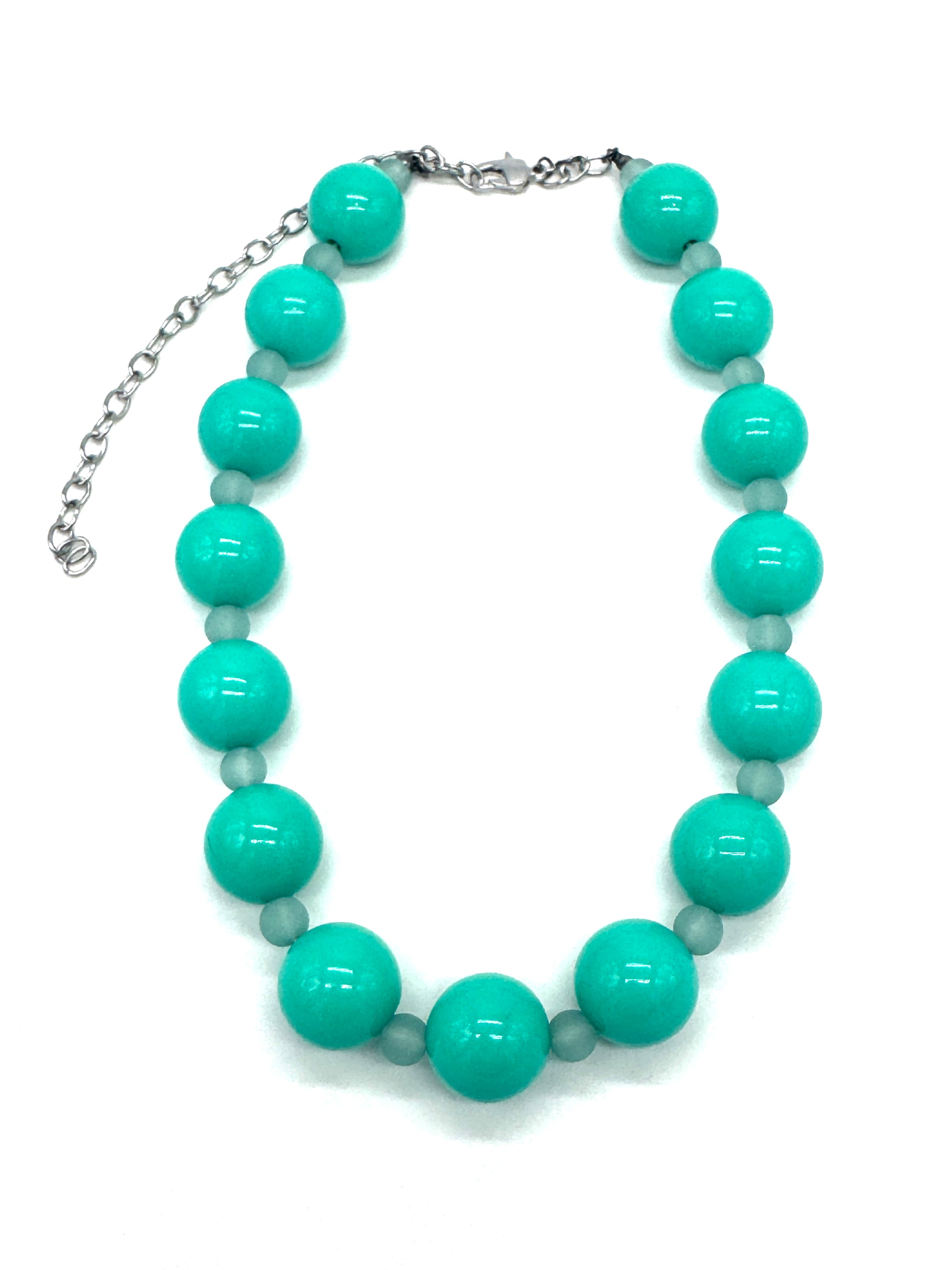 Necklace with turquoise beads on a white background