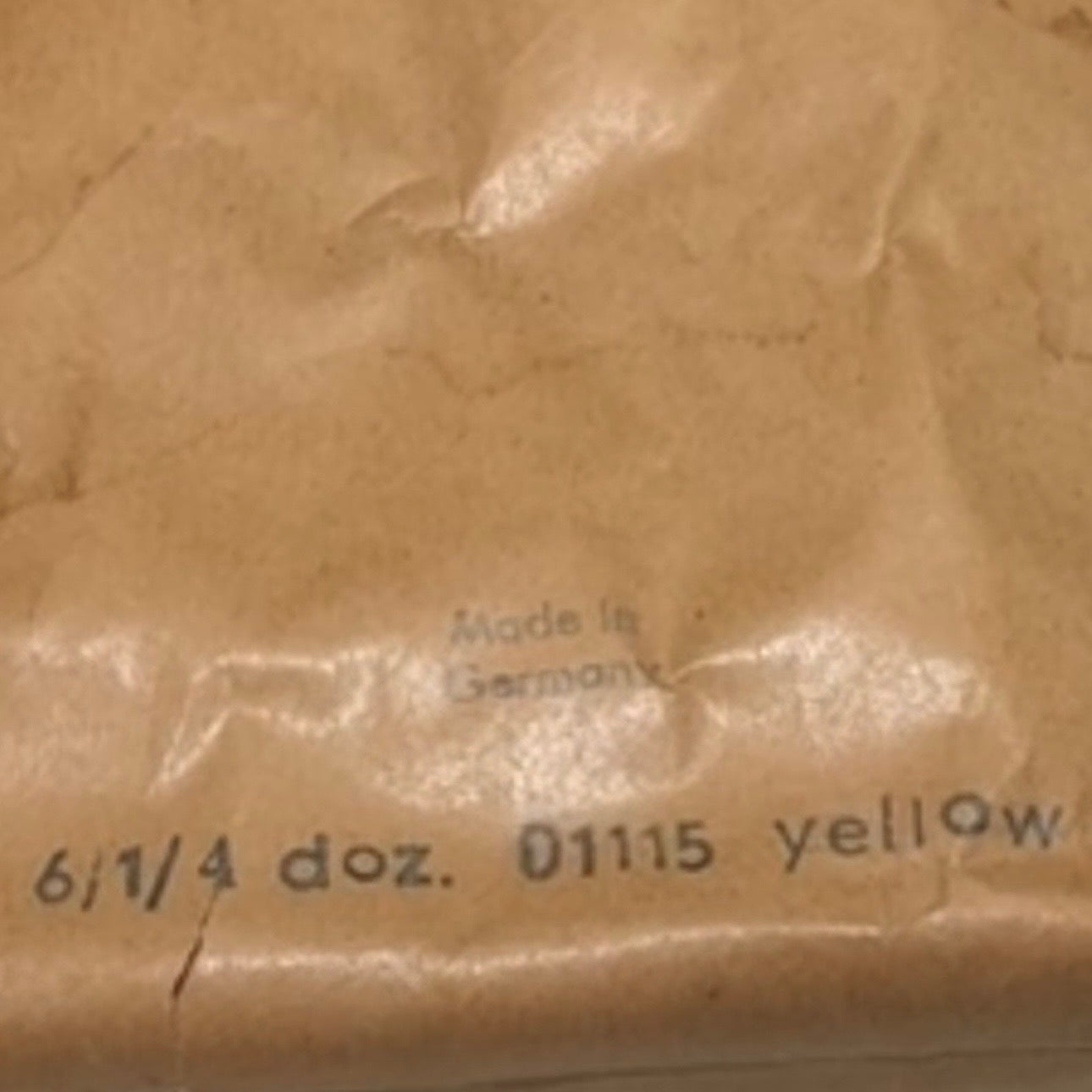 Close-up of brown paper with text &
