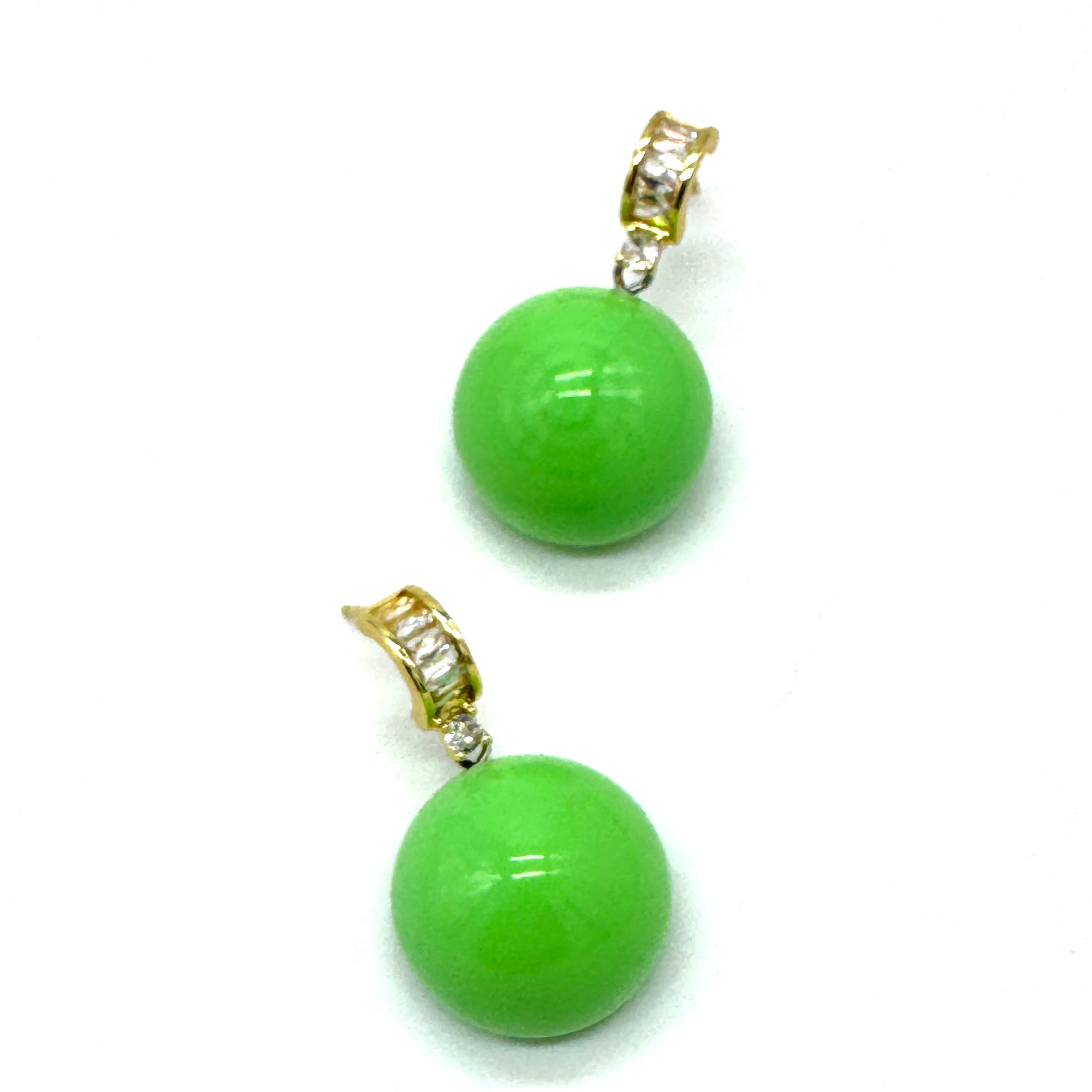Lime green lucite drops dangle from crystal-embellished earwires.