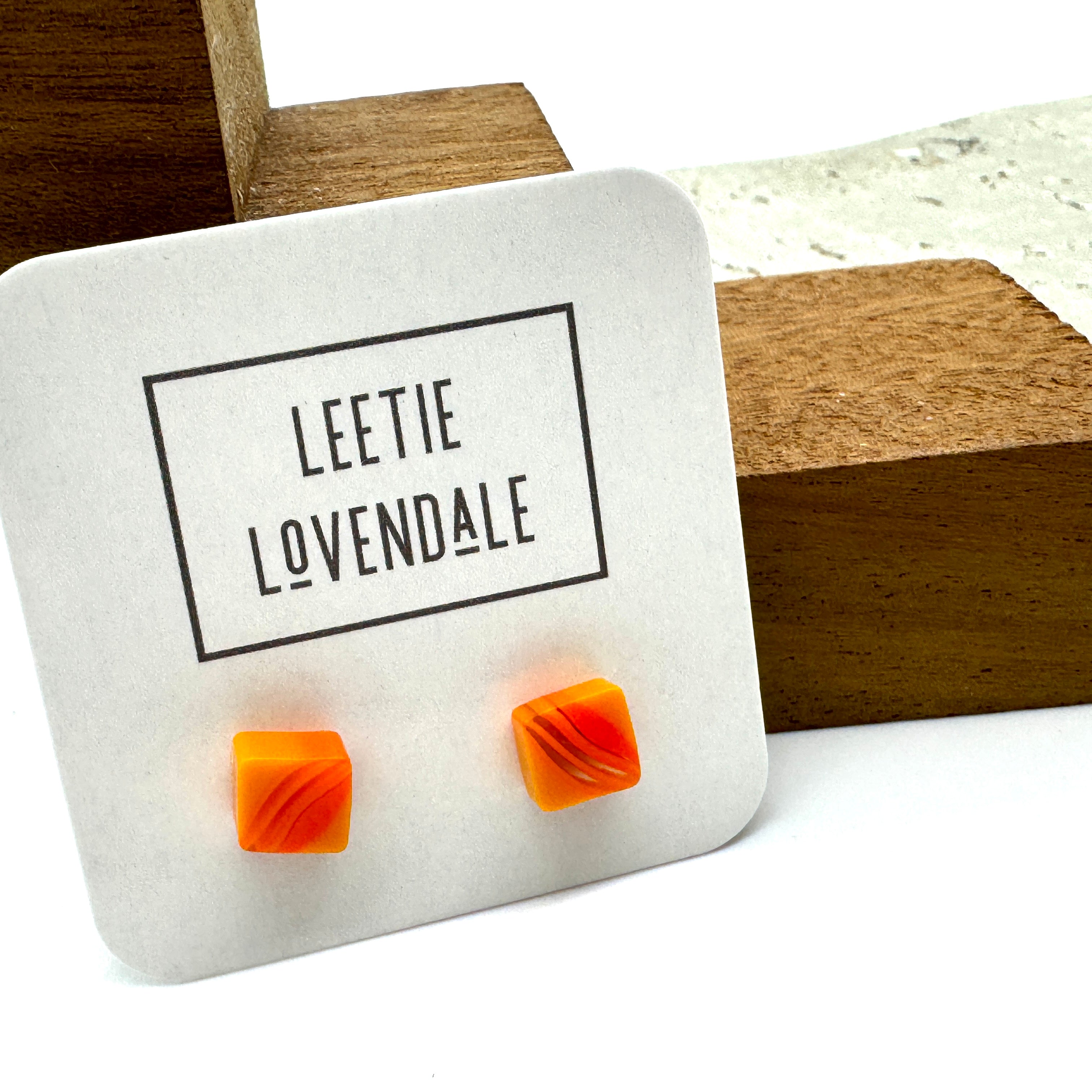 orange citrus clear stripe studs