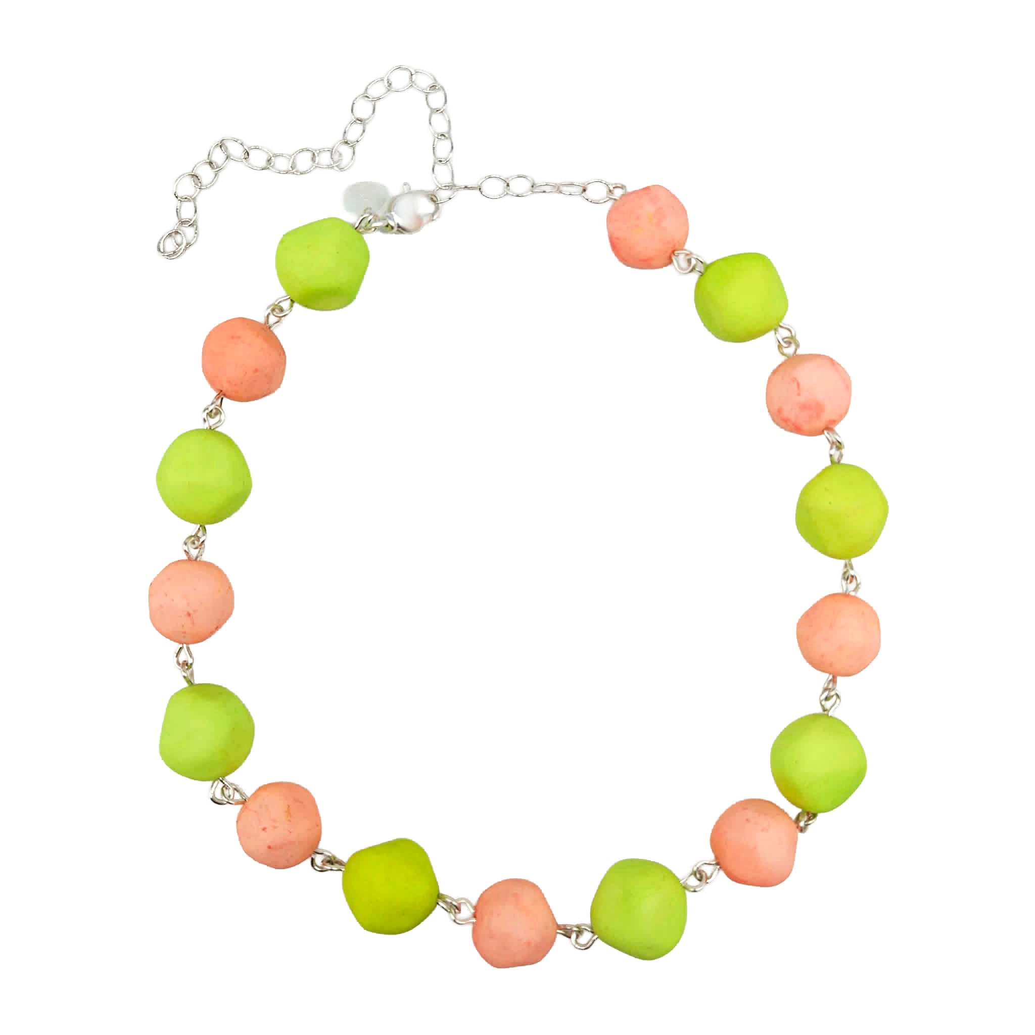 Peach and lime green beaded necklace on a white background.