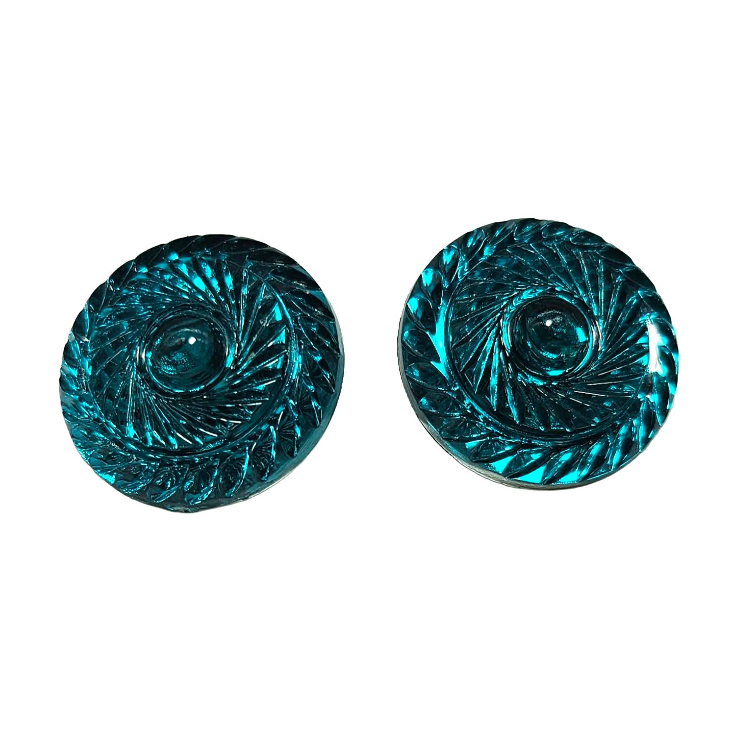 Pair of turquoise spiral earrings on a white background