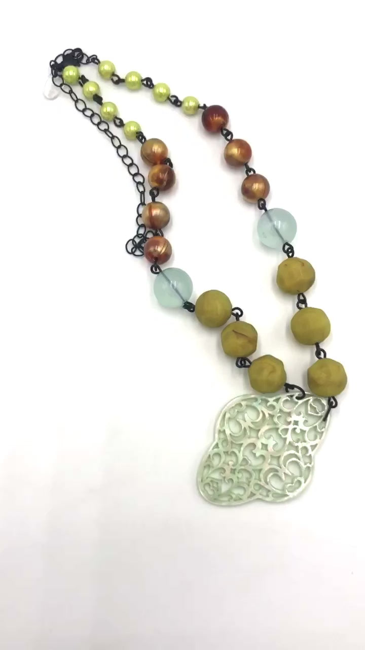 video of hand wired necklace with pendant