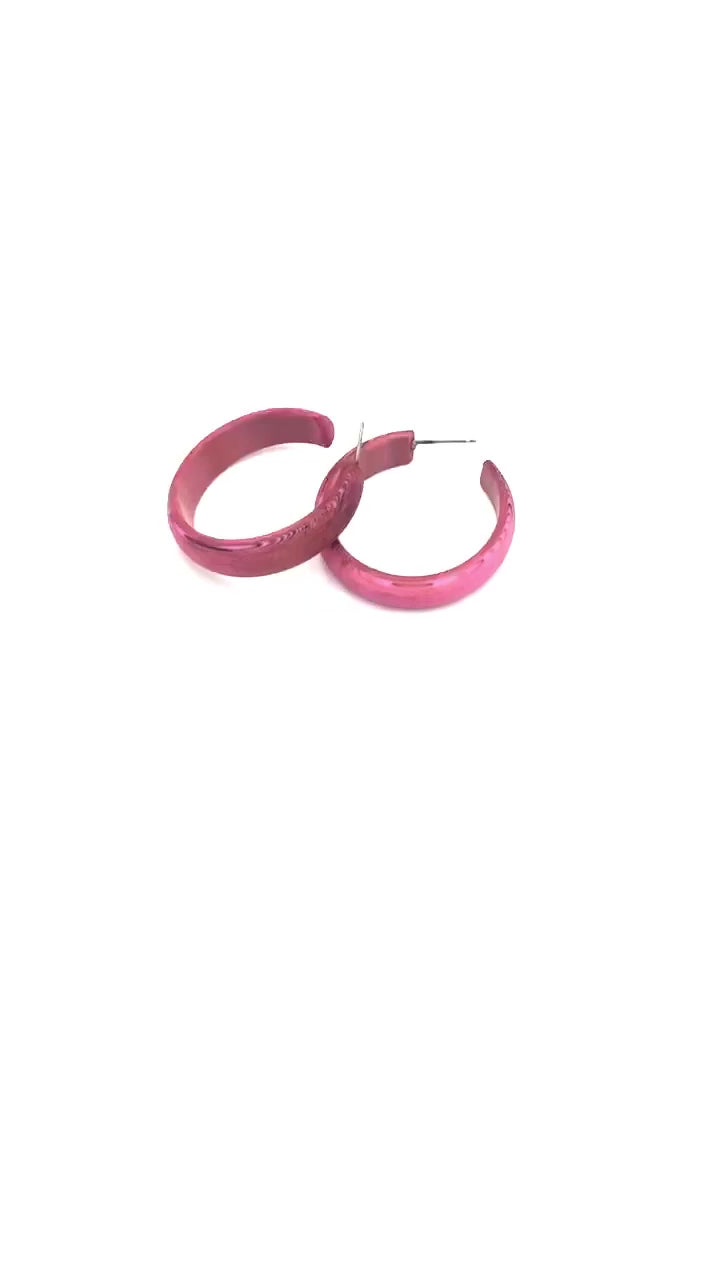 video of dusty pink marbled hoop earrings