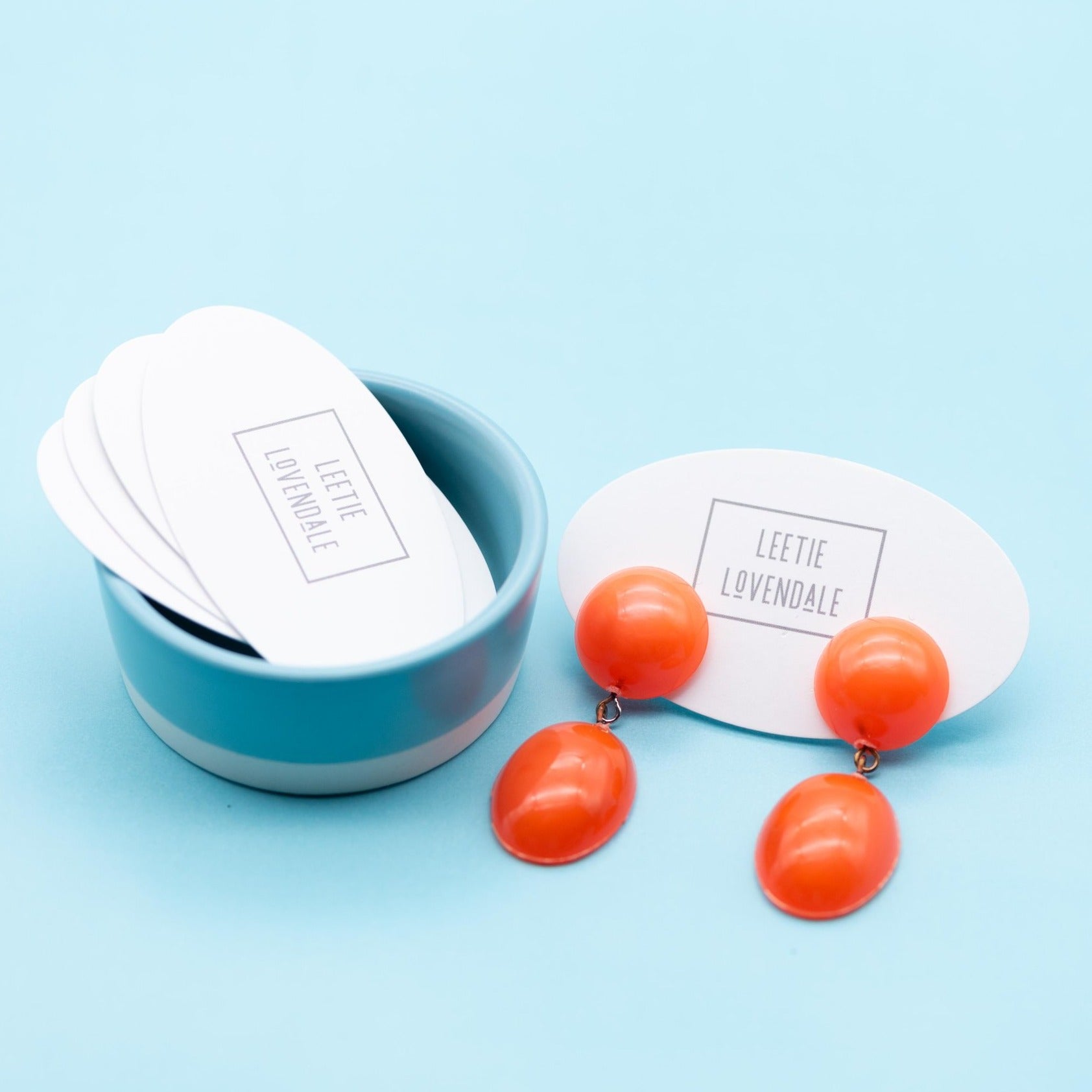 bright orange statement earrings