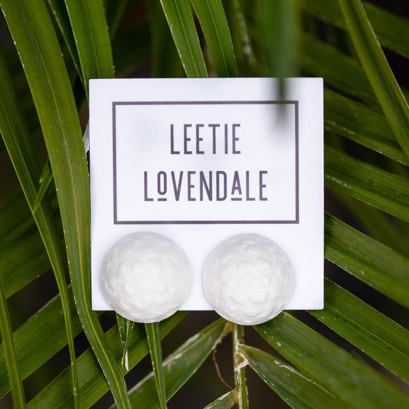 white textured earrings