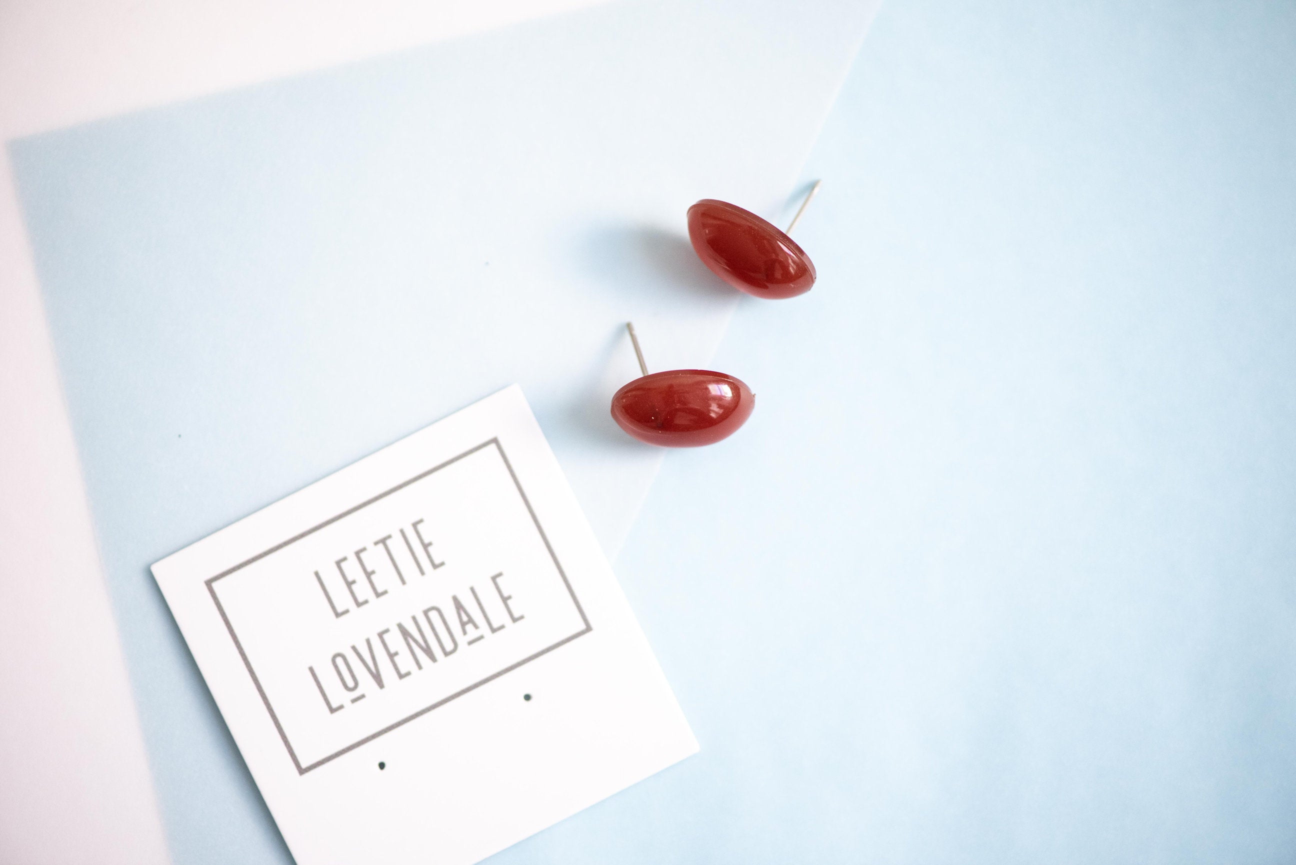 deep magenta ovals studs