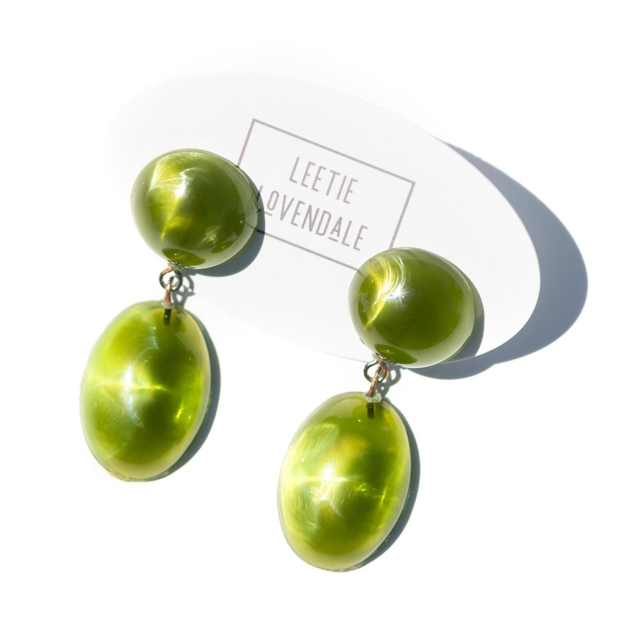 green statement earrings