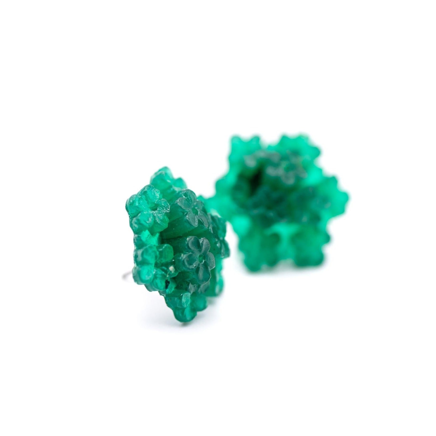 closeup green flower earring