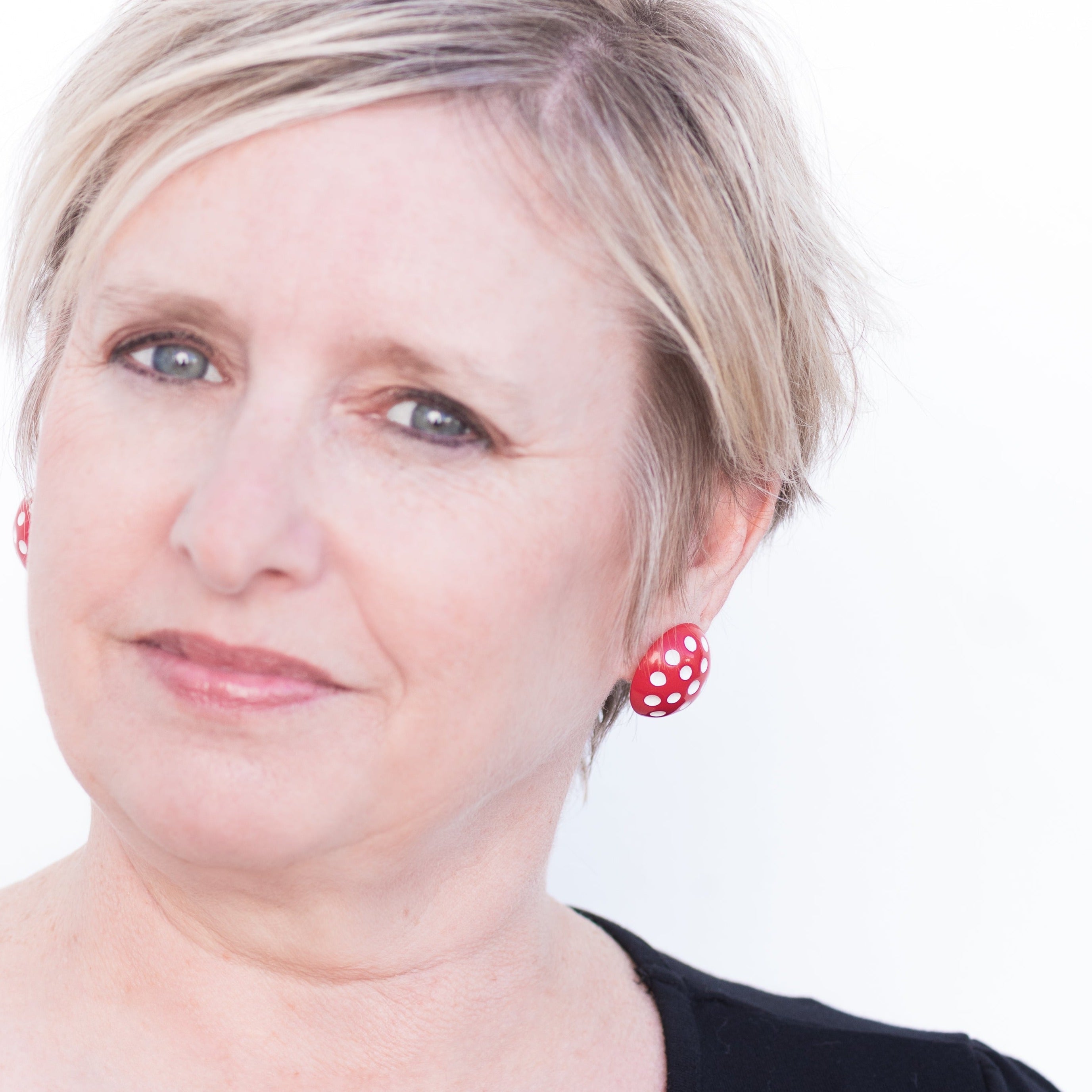 red polka dotted earrings