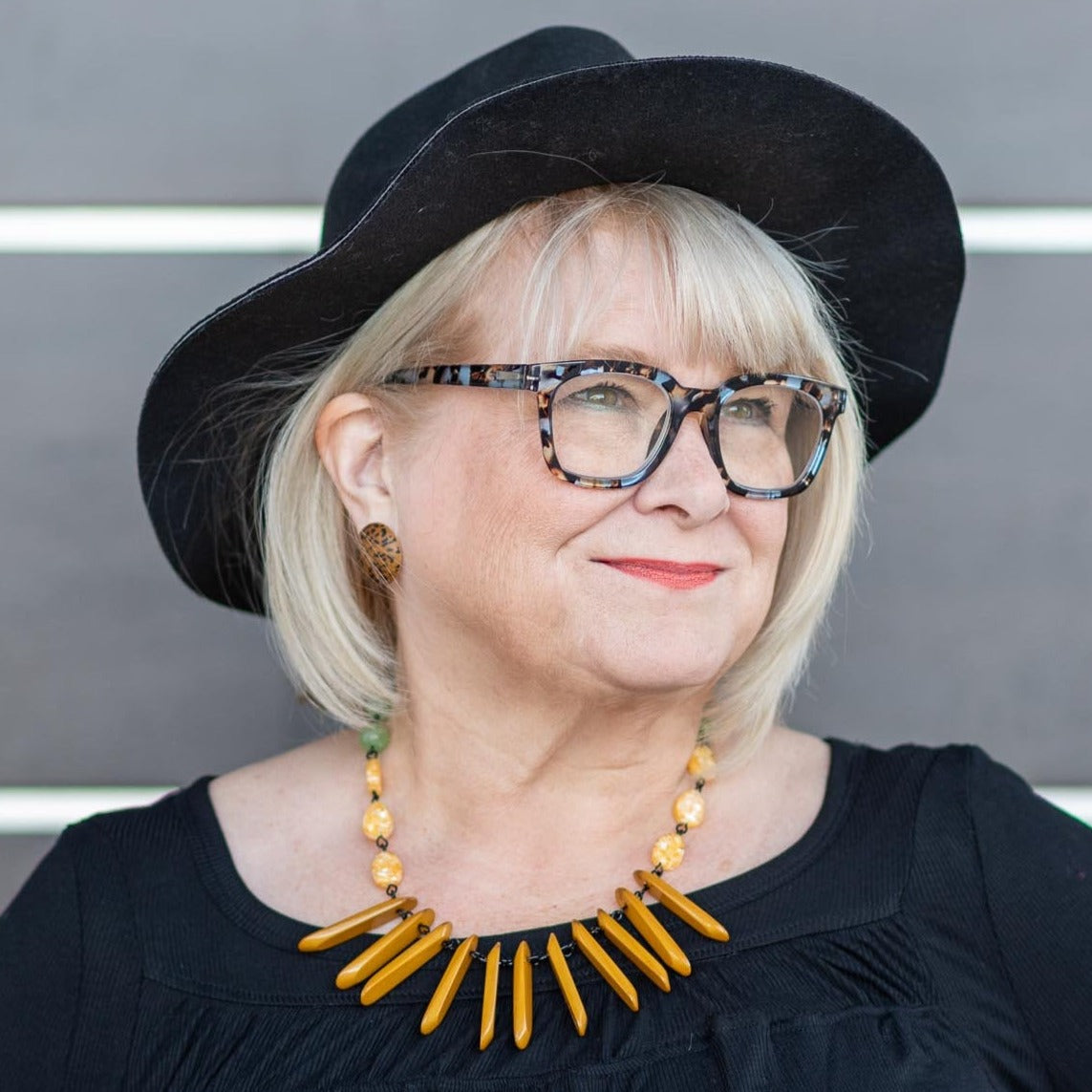 jan in leopard earrings