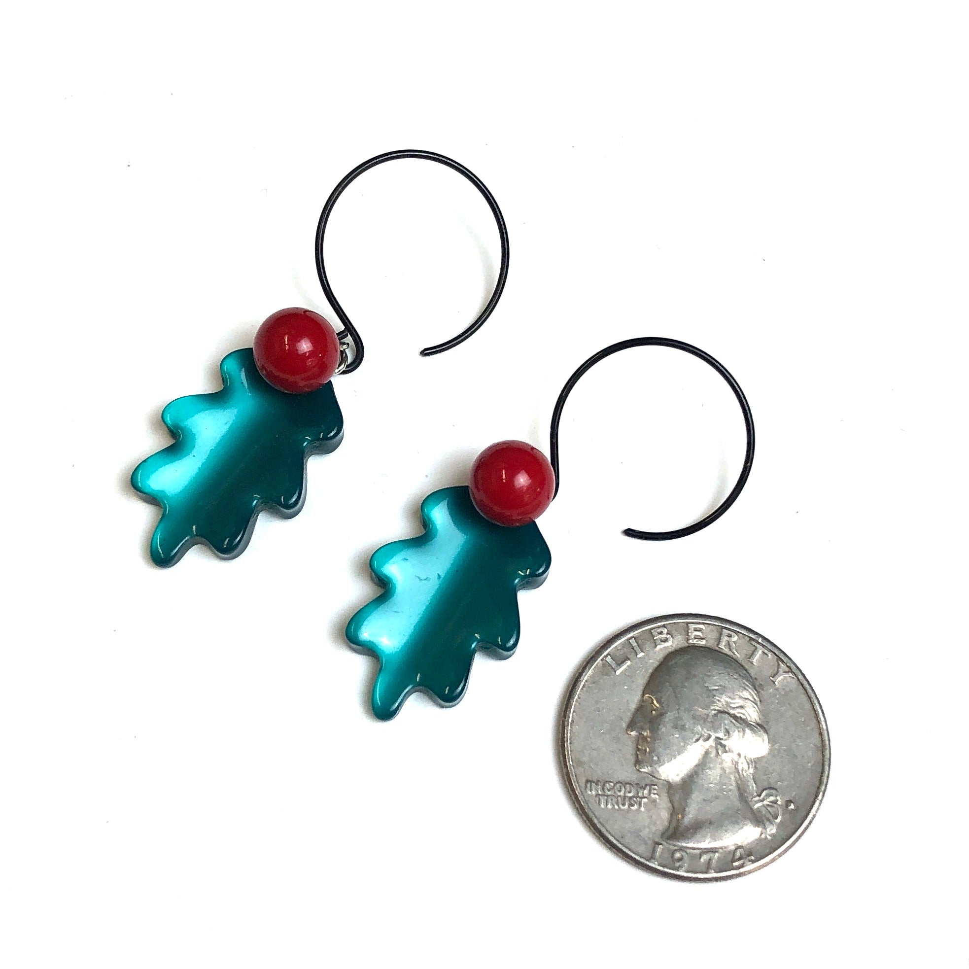 green moonglow leaf earrings