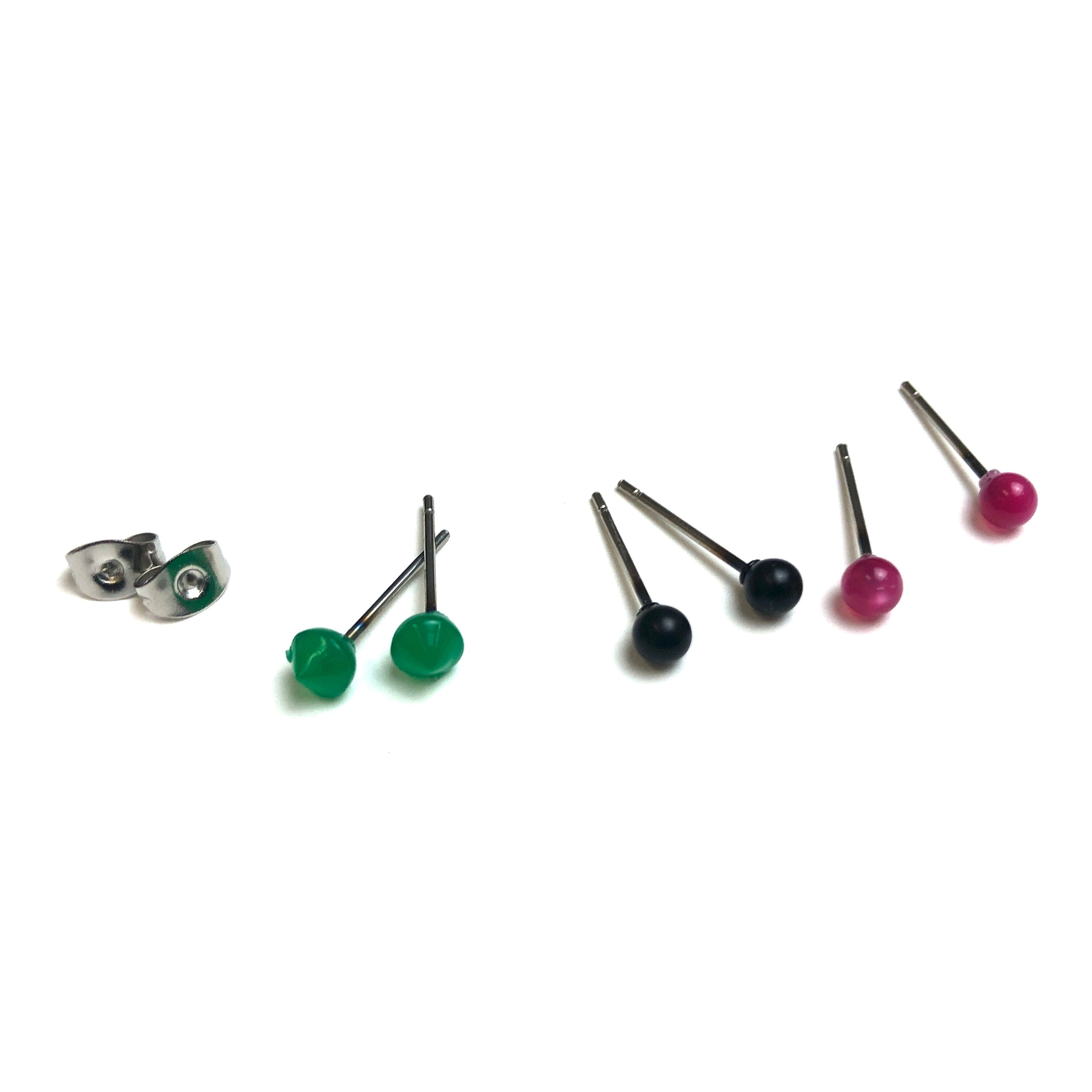 green black pink studs