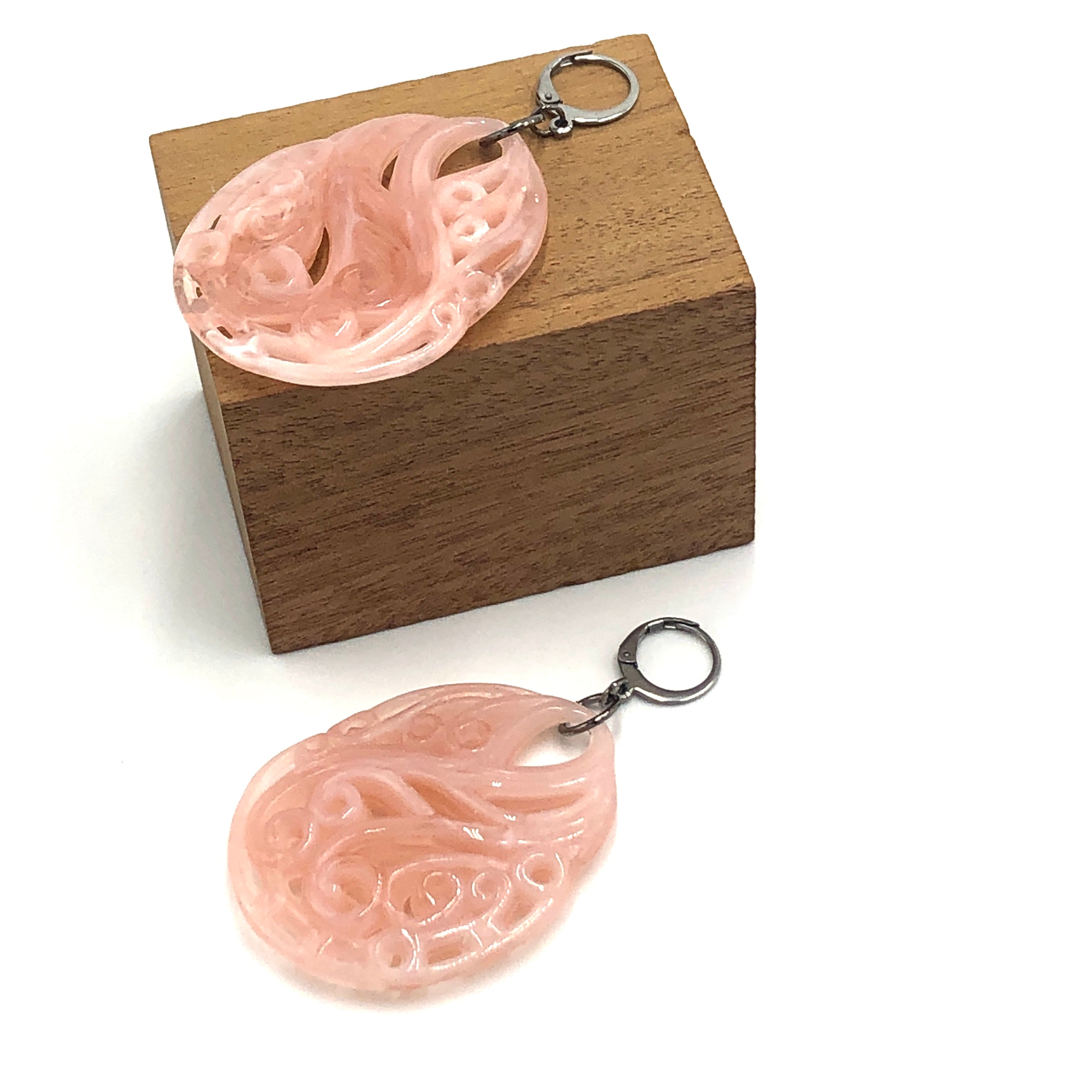 pink statement earrings