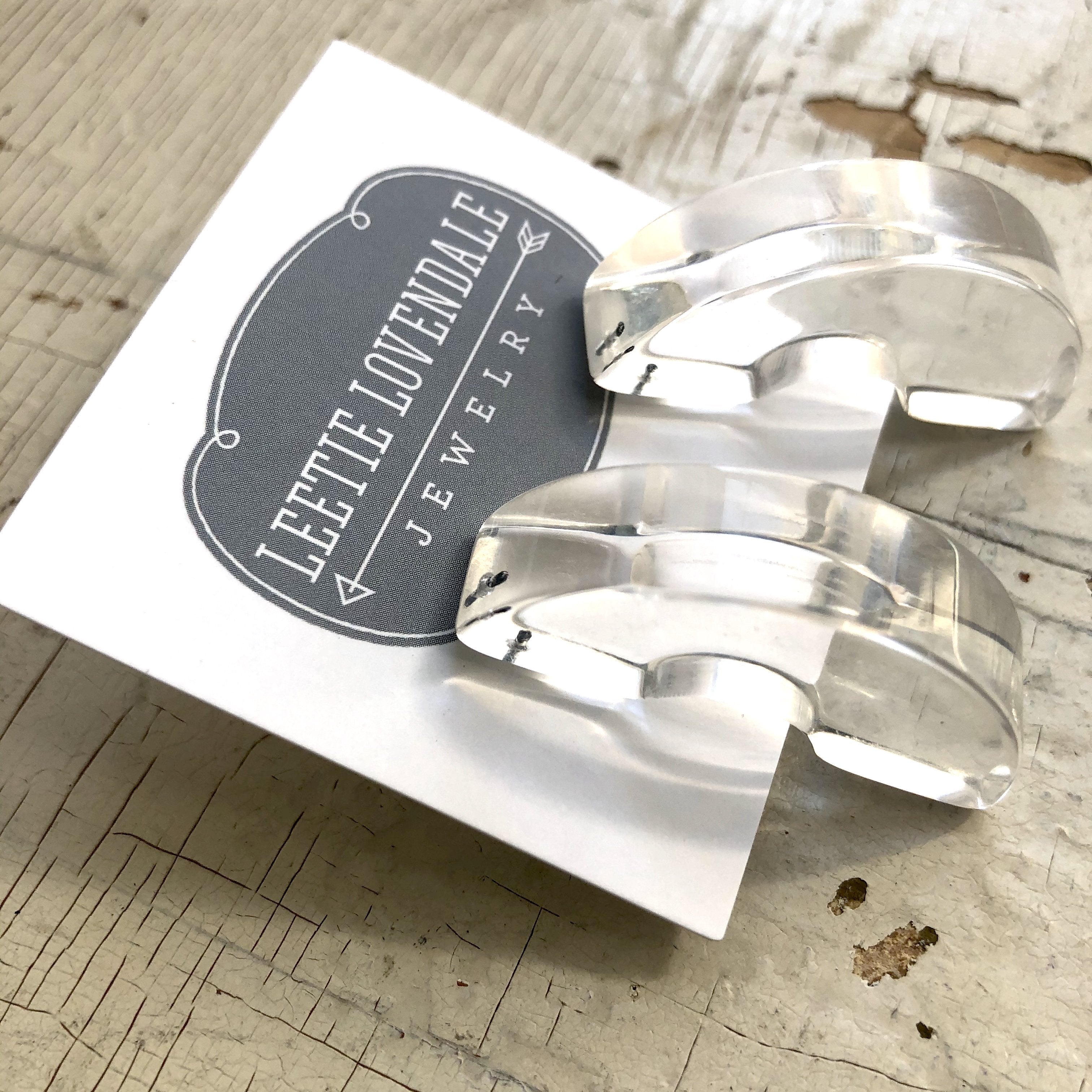 clear half hoop studs