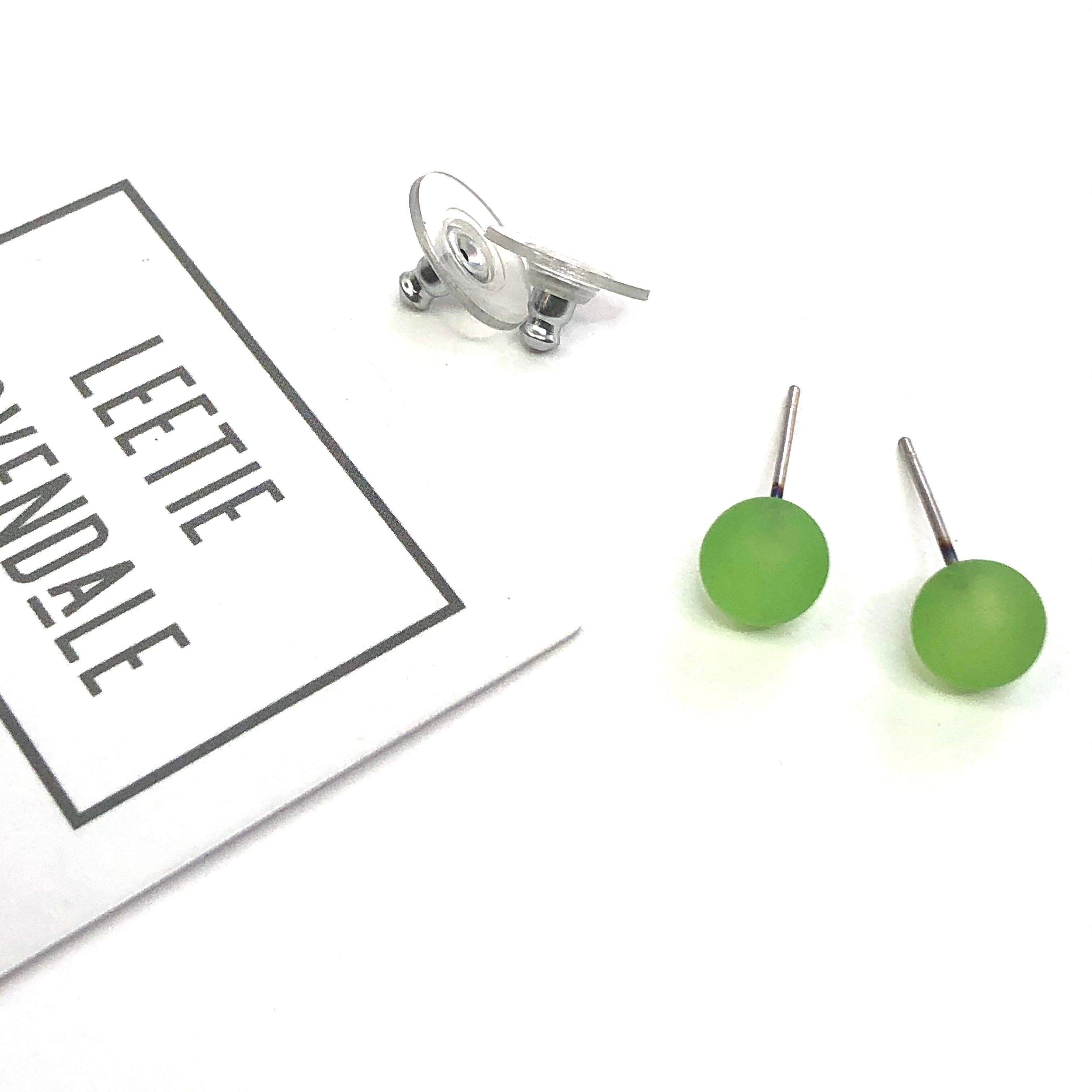 green lucite studs