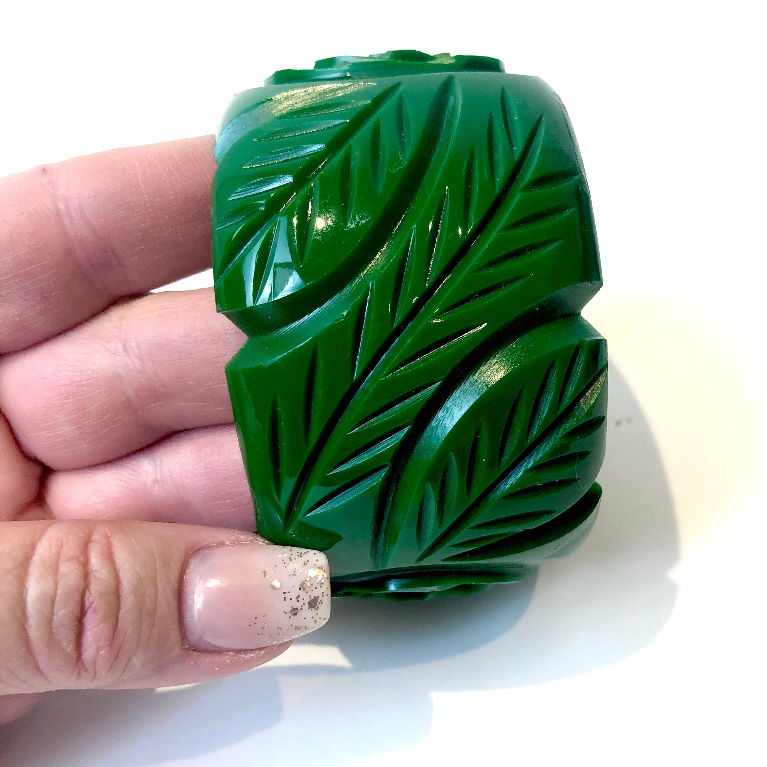 green carved bangle