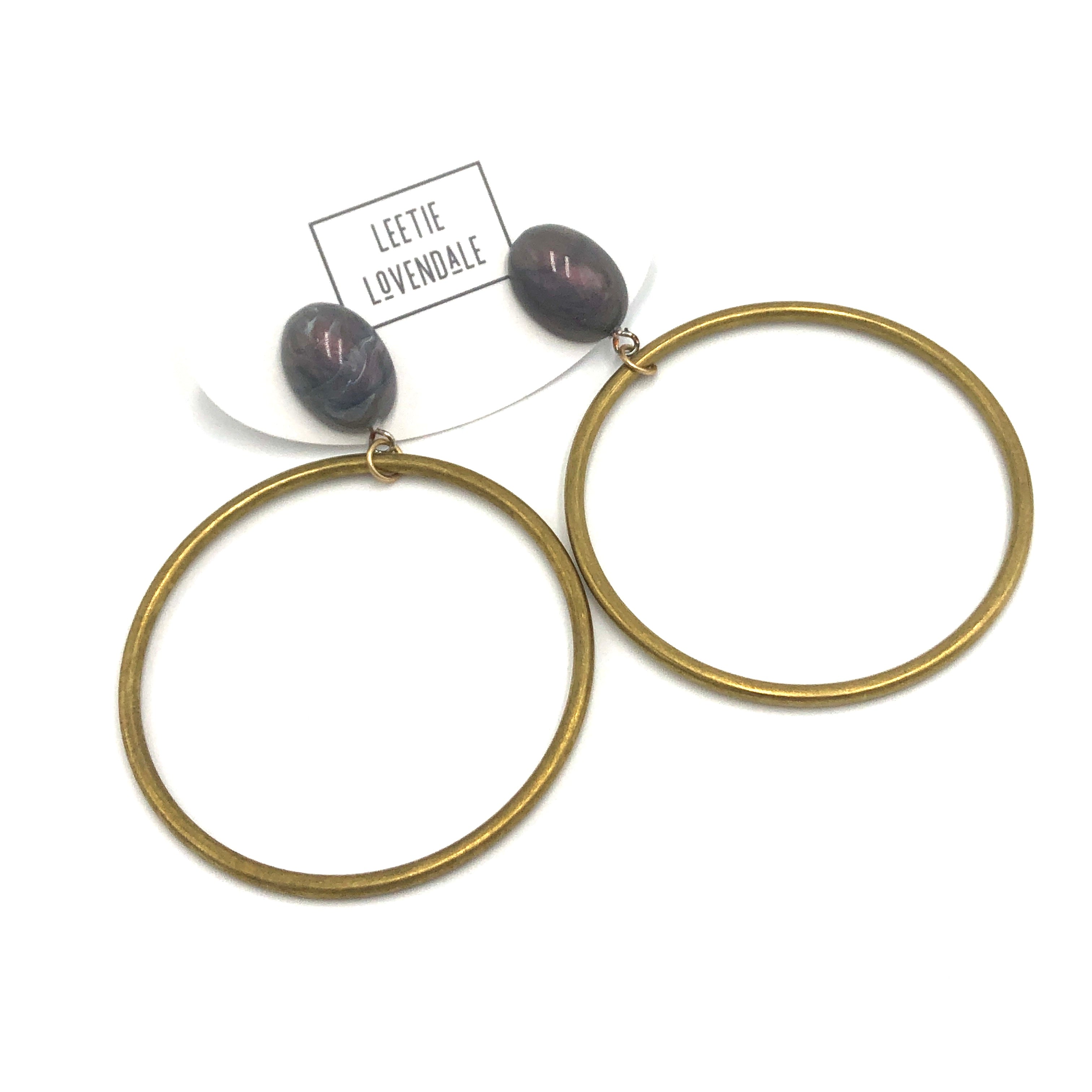 grey and brass earrings