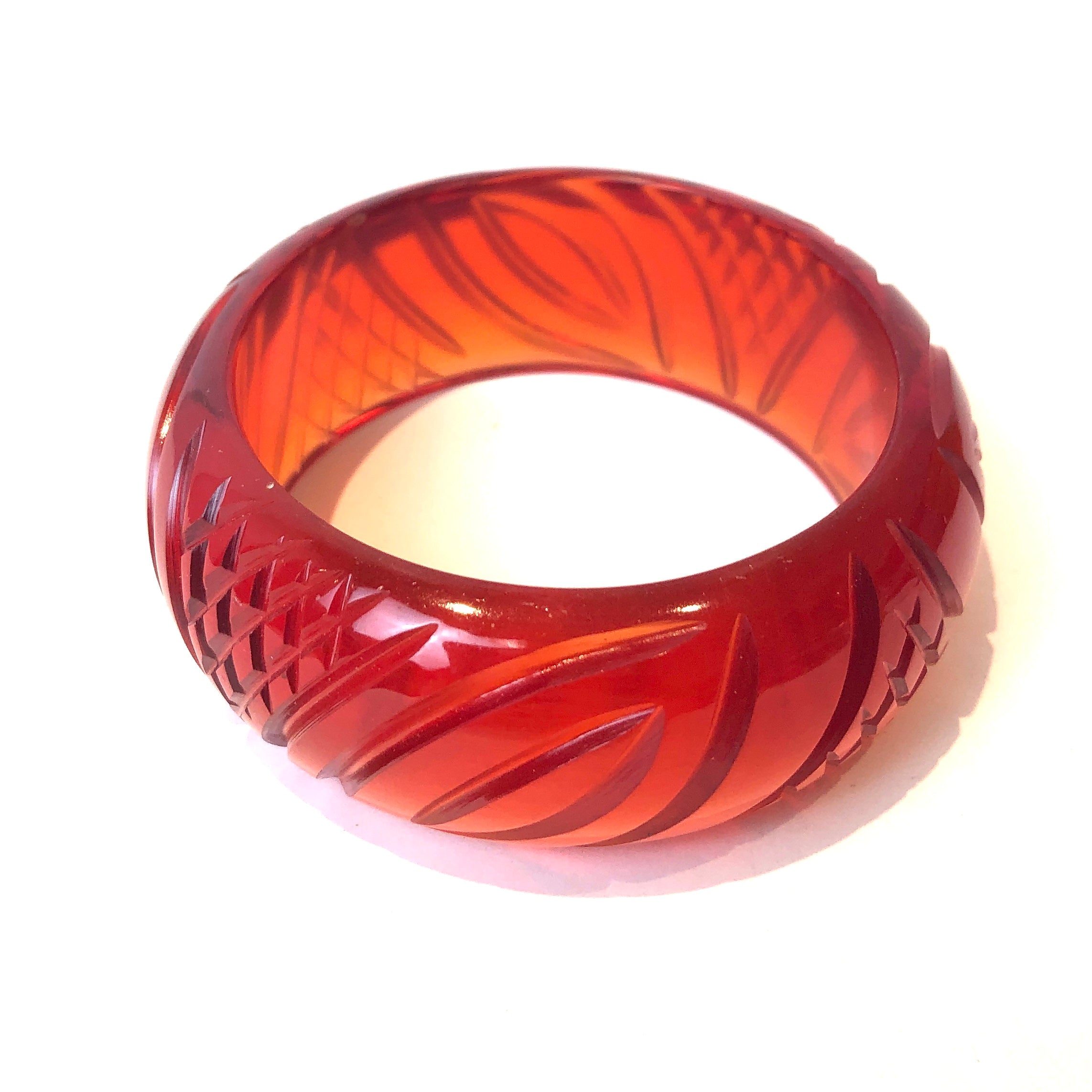 orange carved bangle