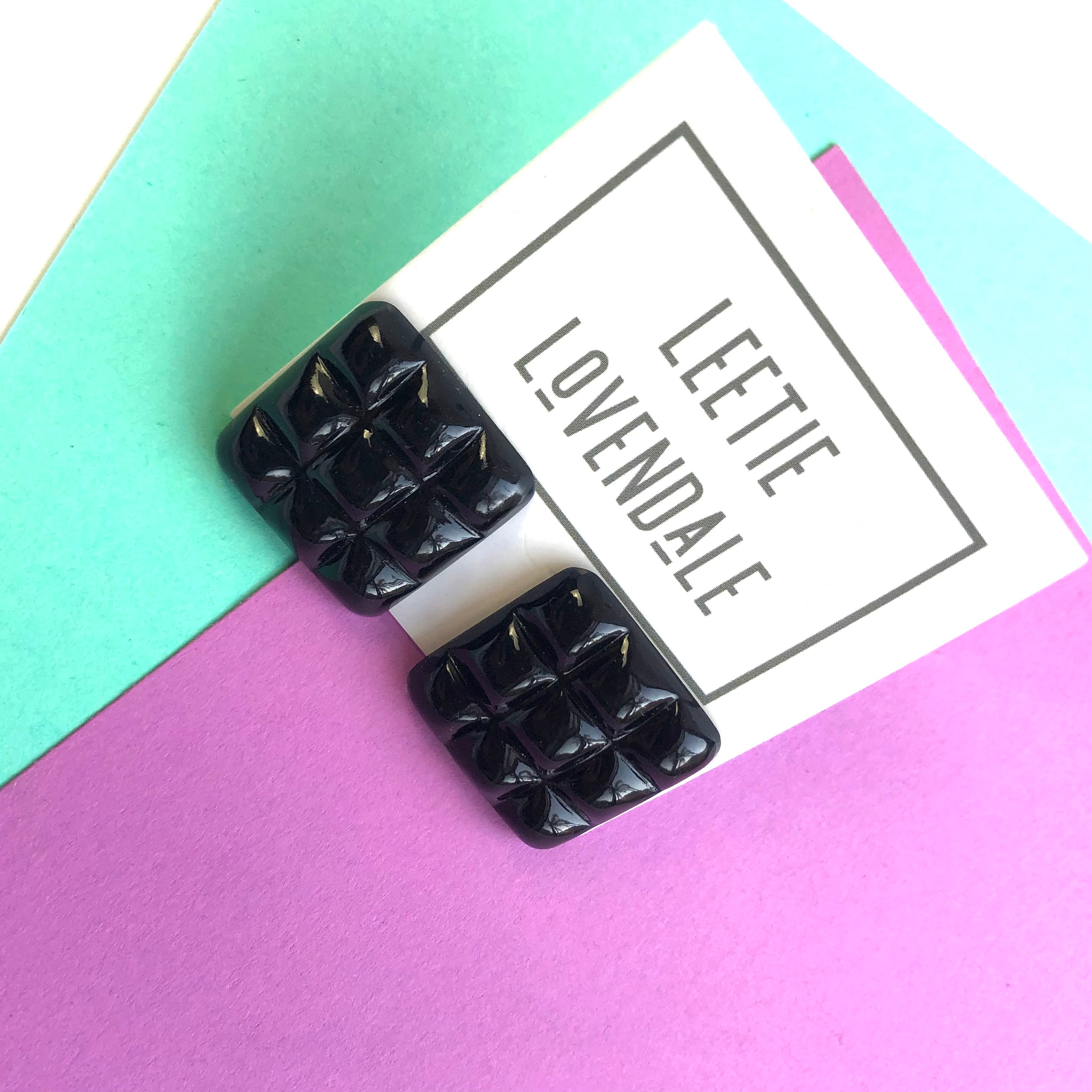 black earrings textured