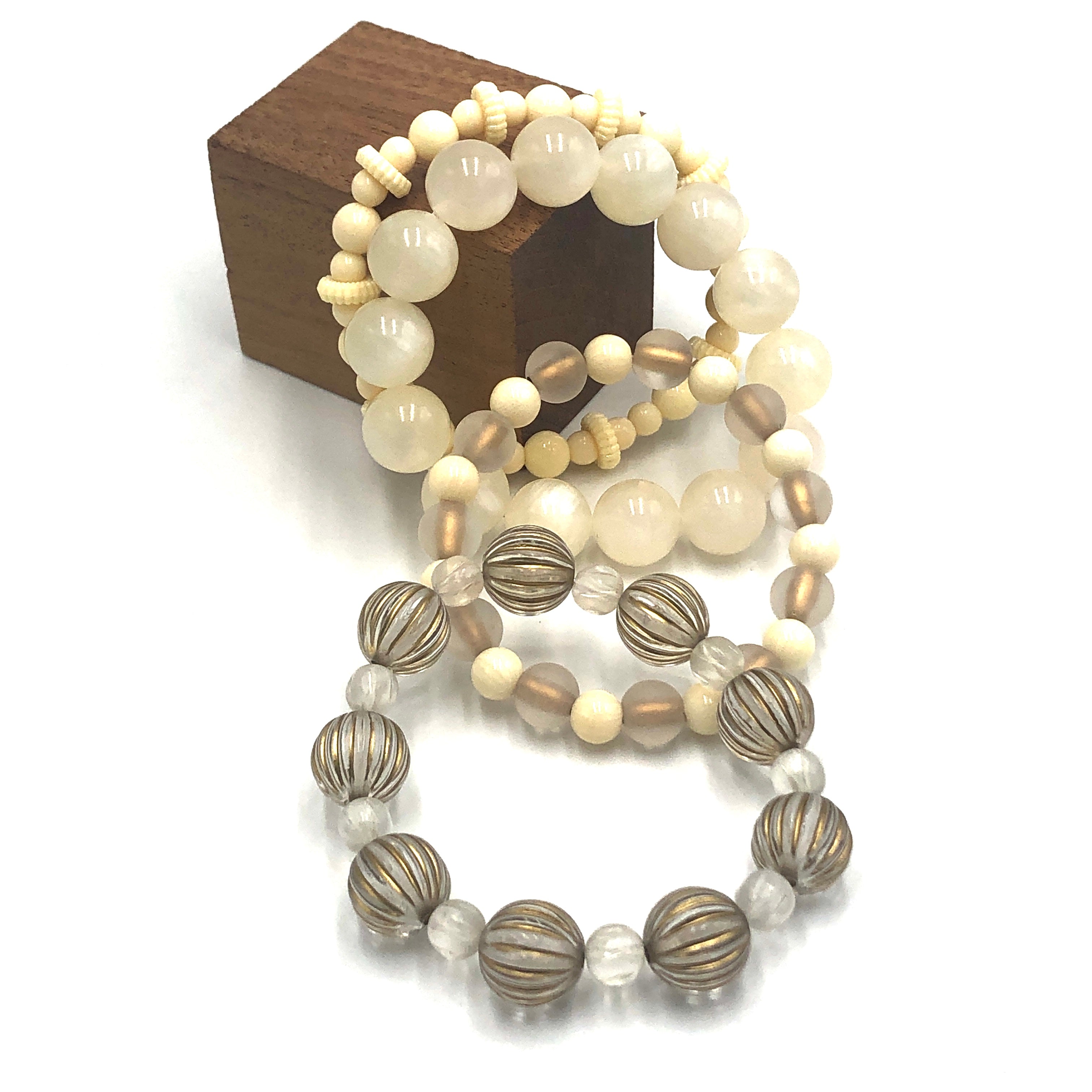 cream gold stack bracelets