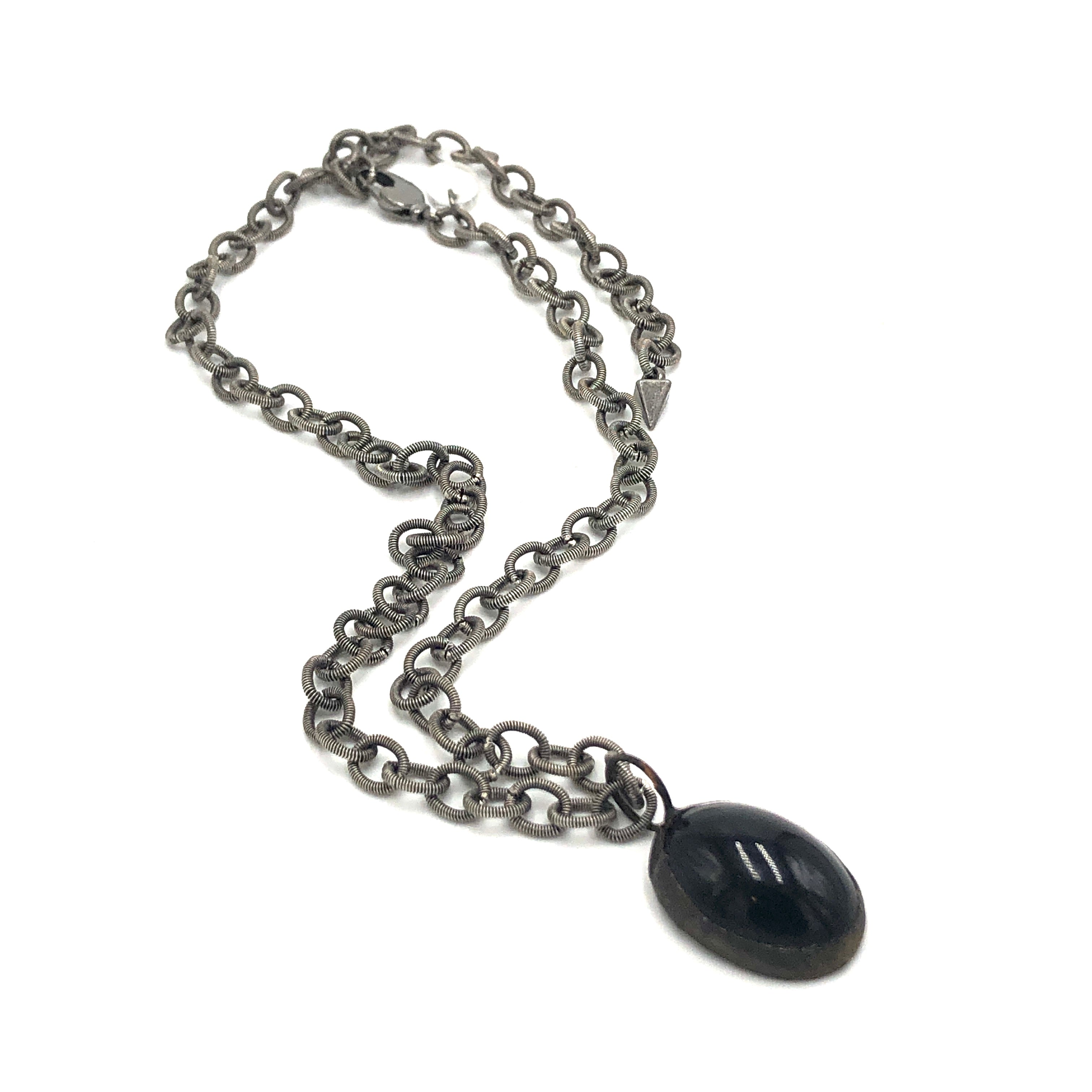 black shiny pendant