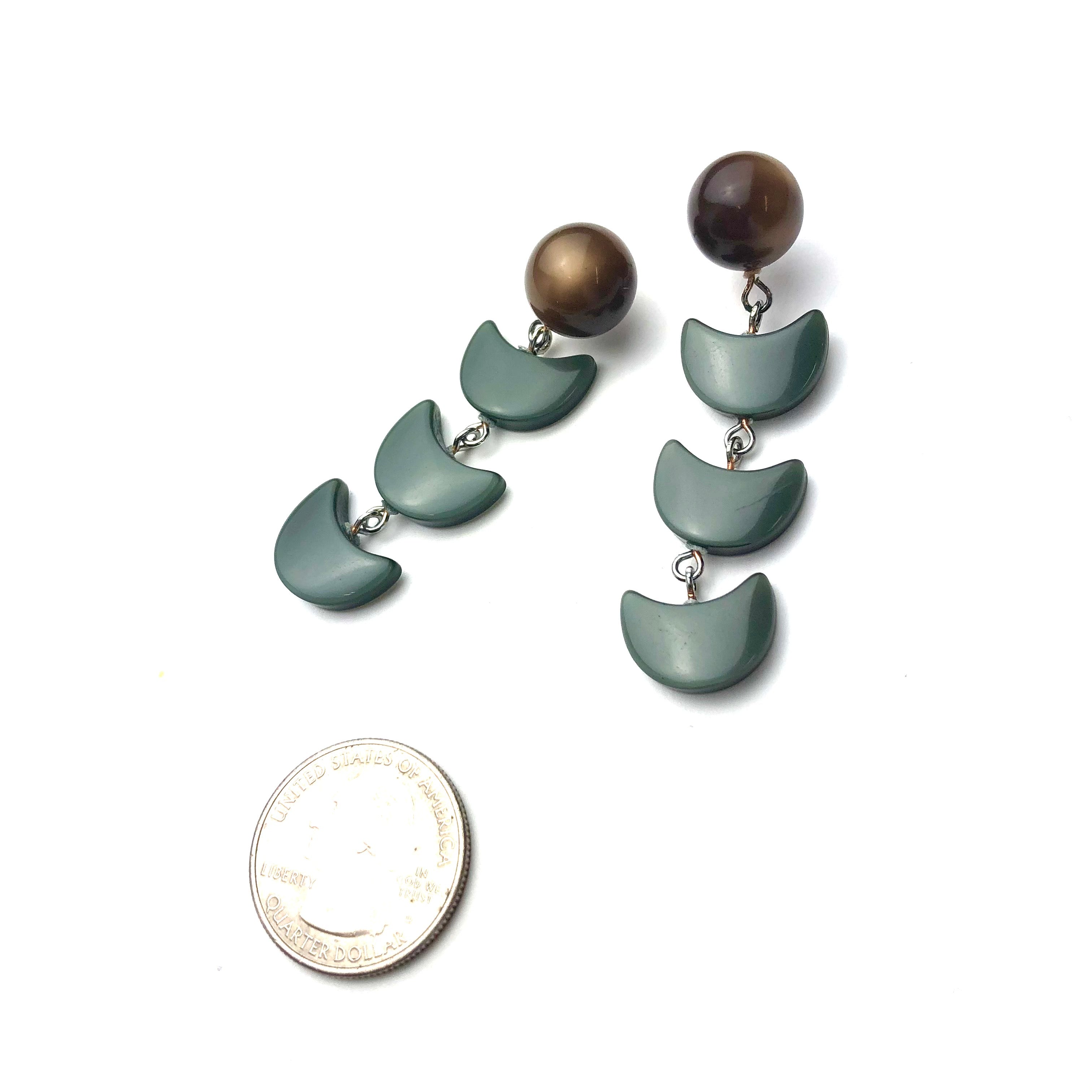 long glow earrings dark green