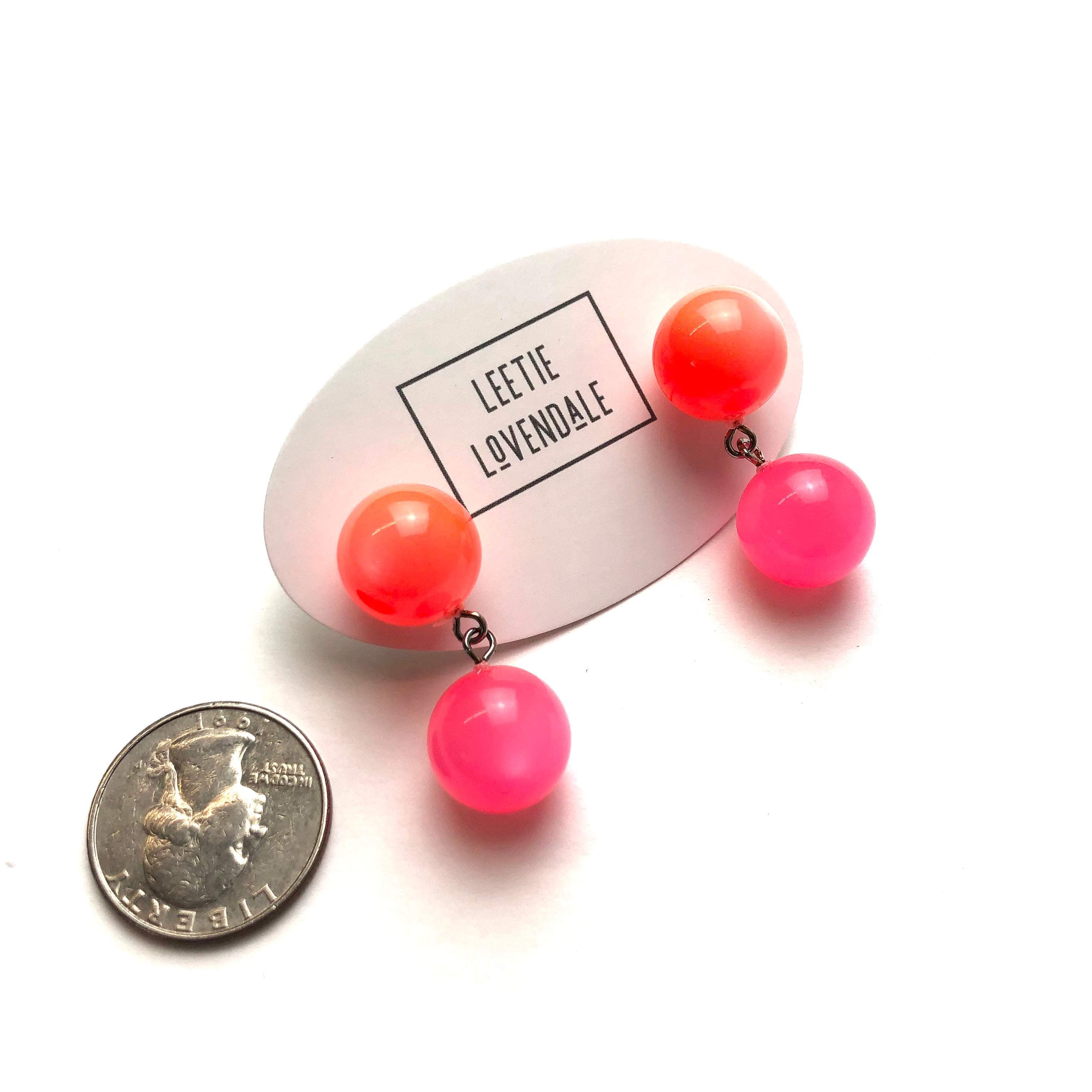 neon orange and pink drops