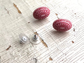 red lucite studs