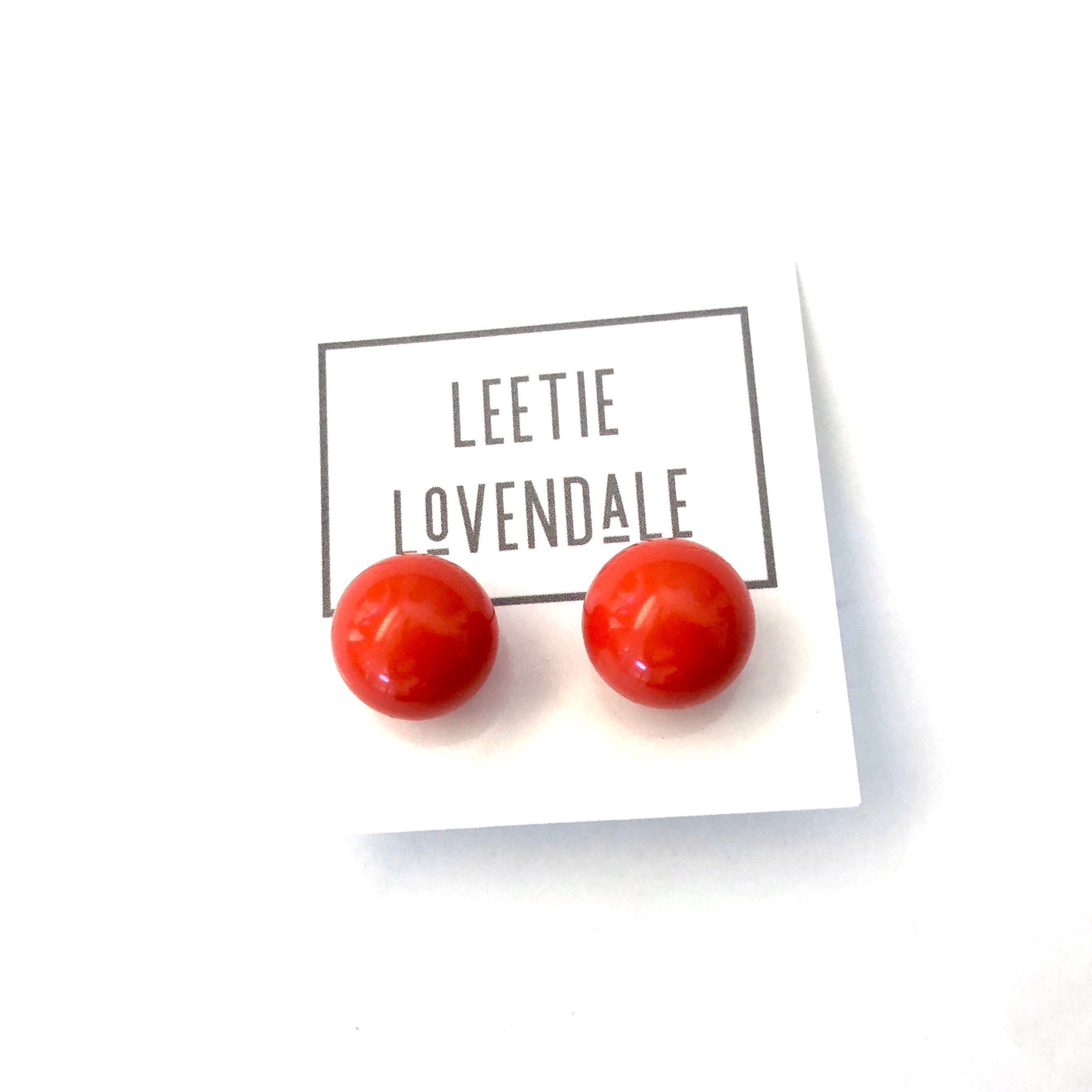 orange ball earrings