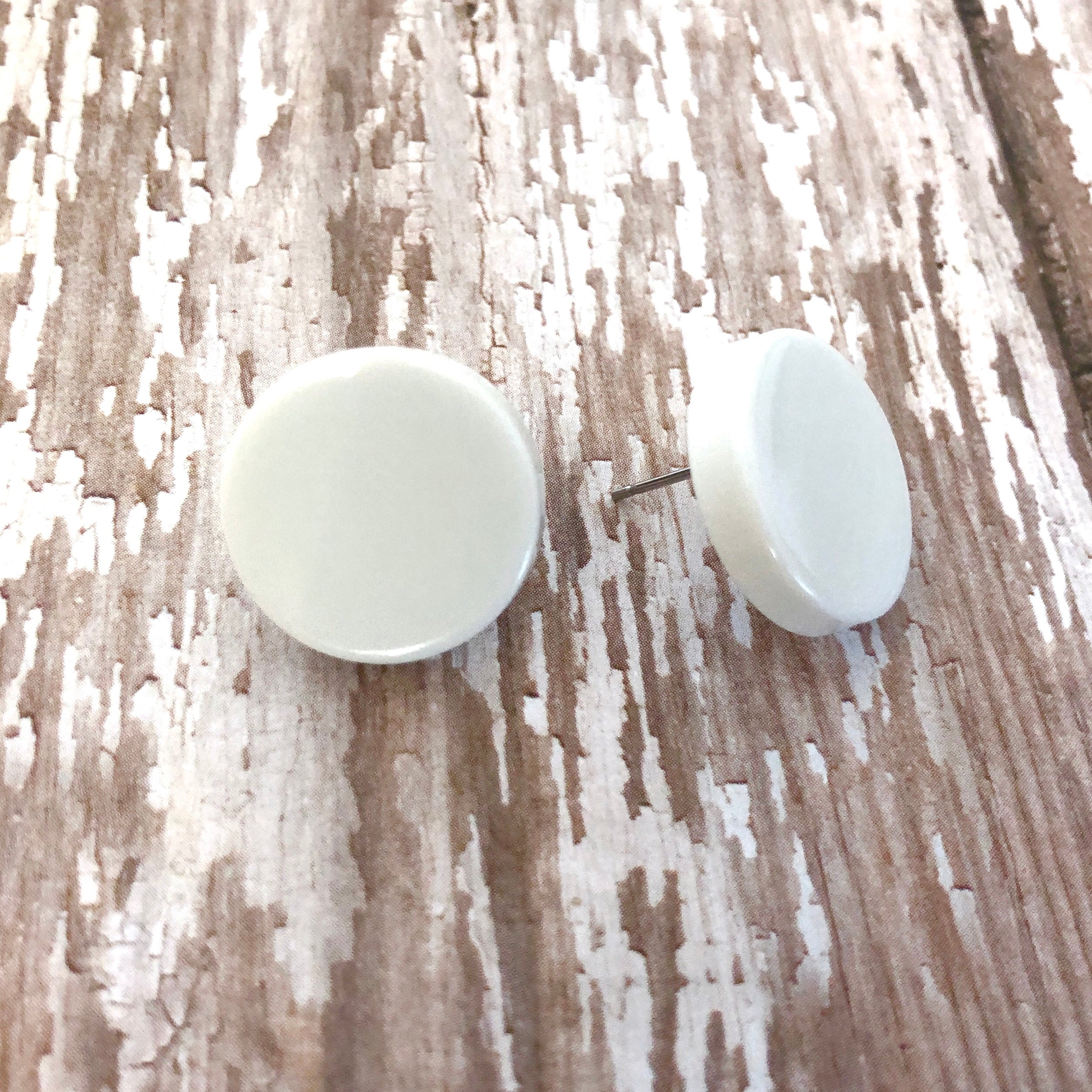 white disc earrings