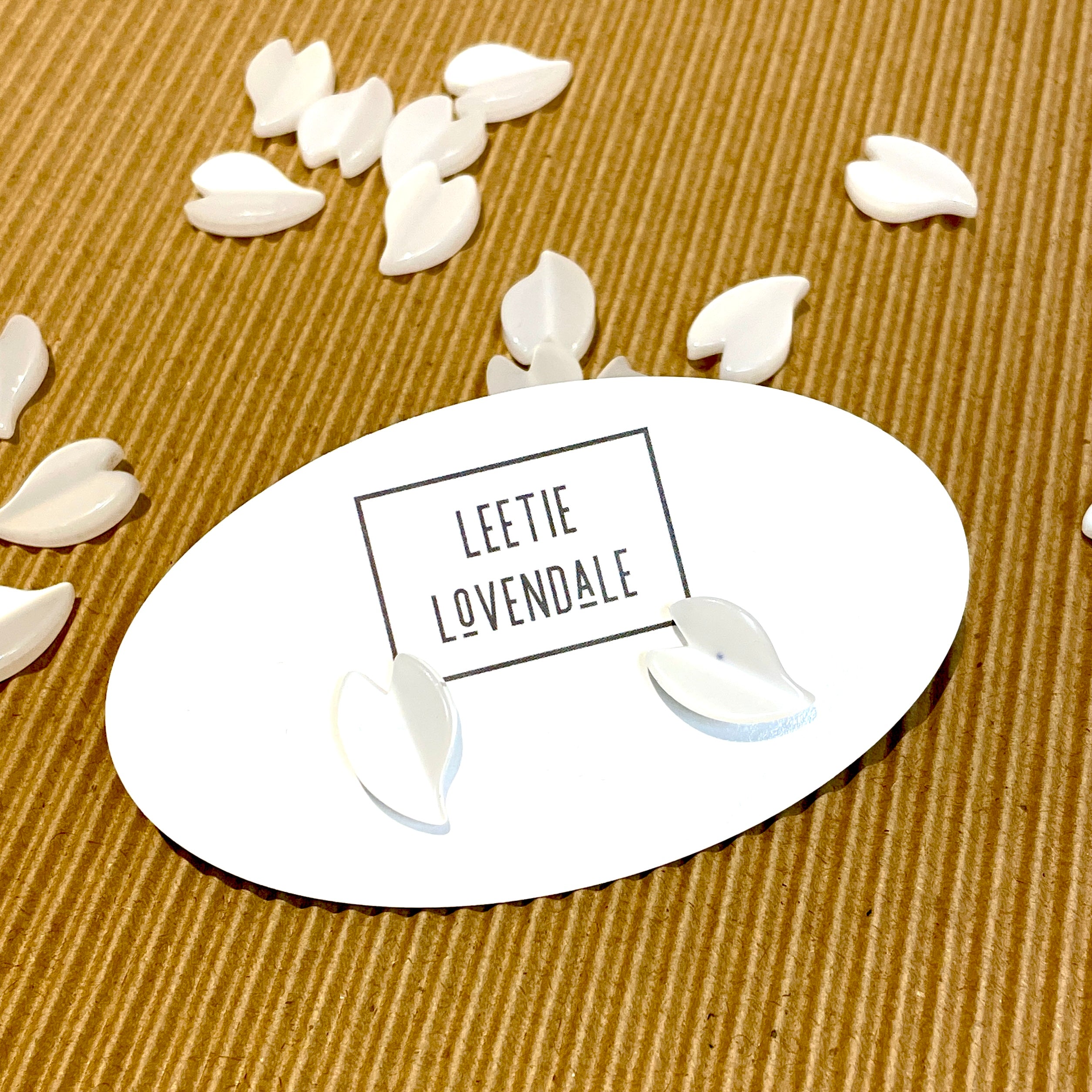 White Moonglow Lucite Studs