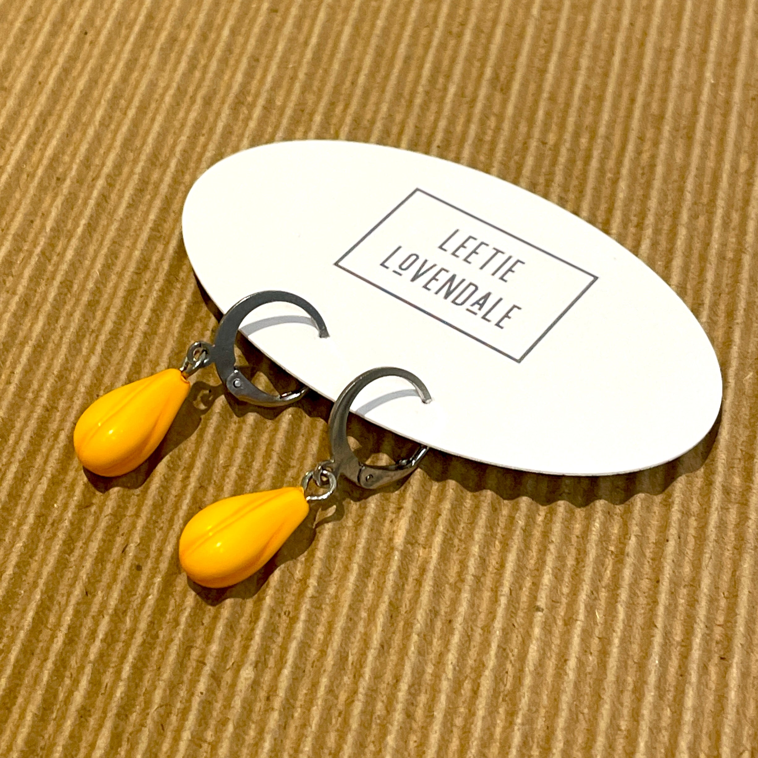 Tangerine cuff hoops