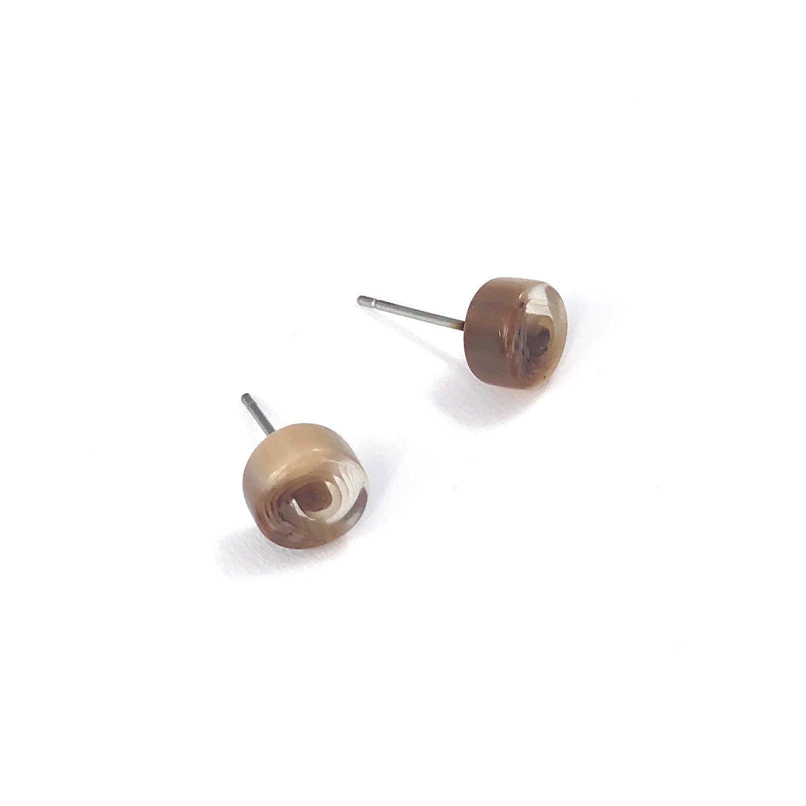 beige stud earrings