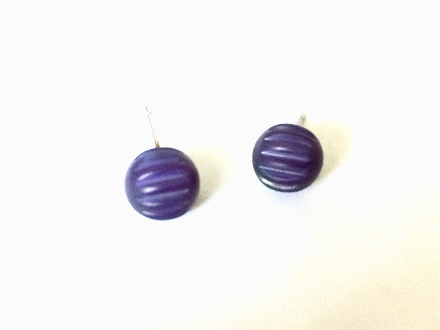 dark blue ribbed studs