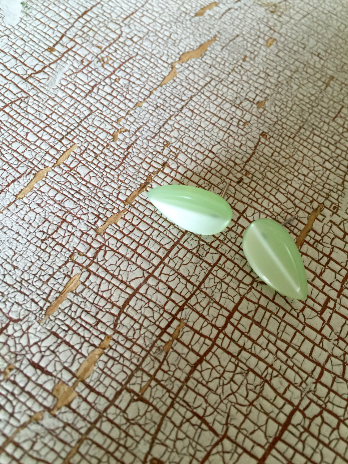 light green moonglow studs