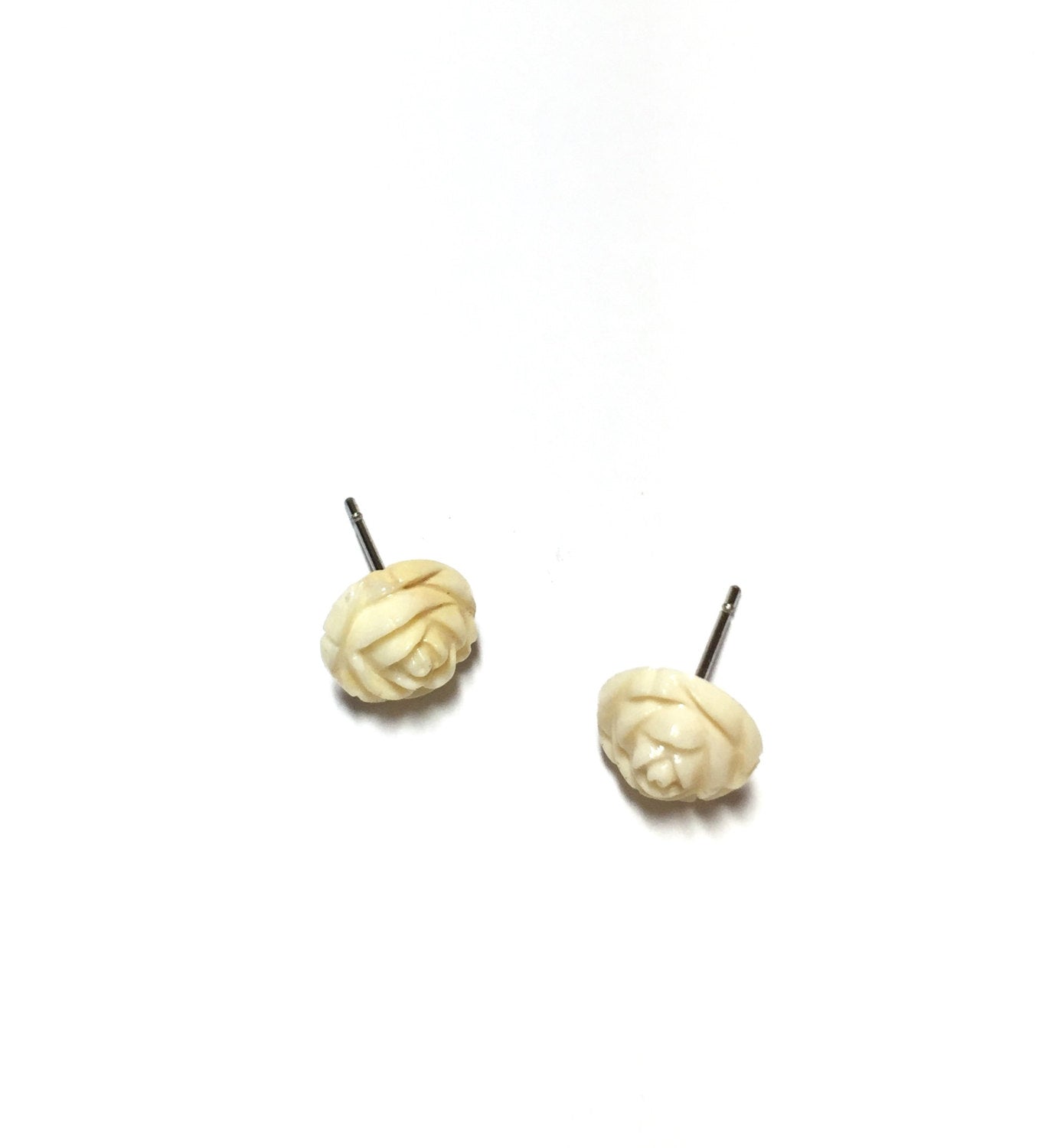 rose studs off white