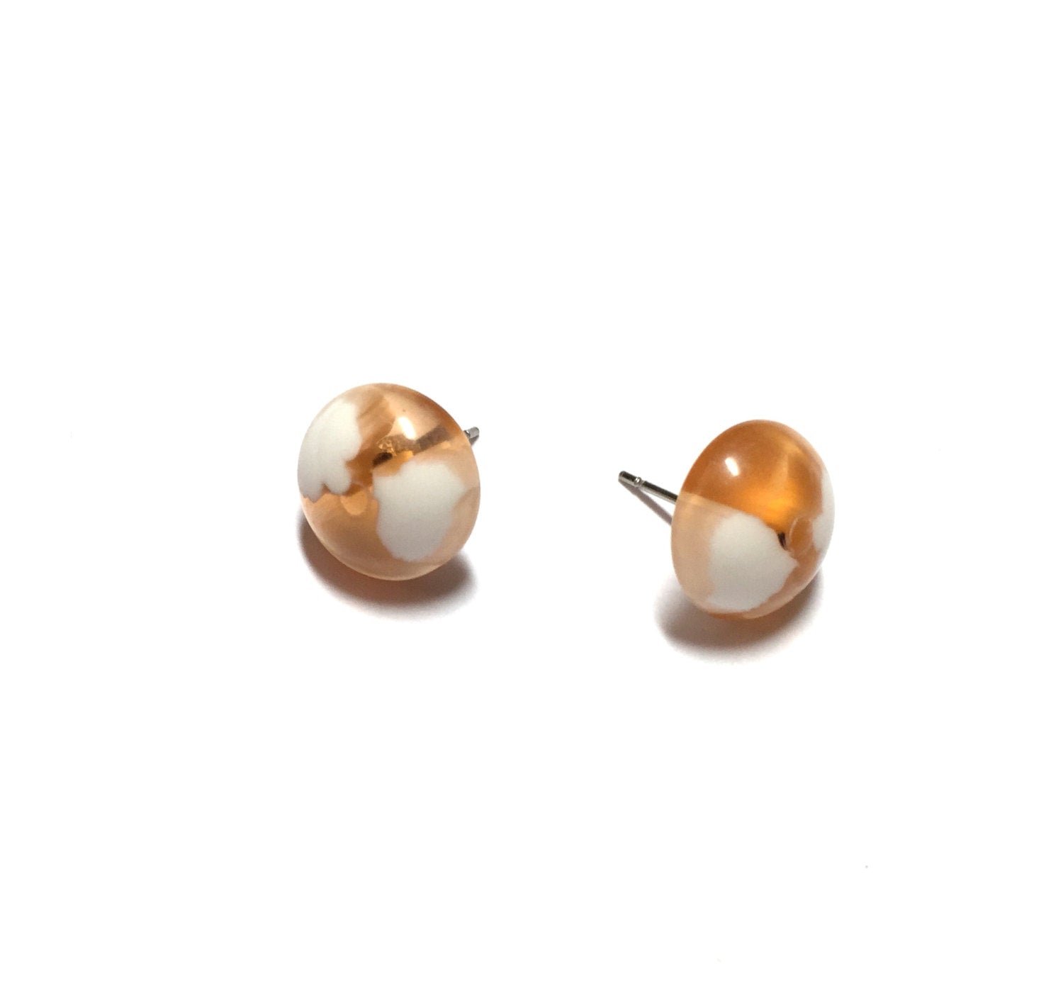 beige stud earrings