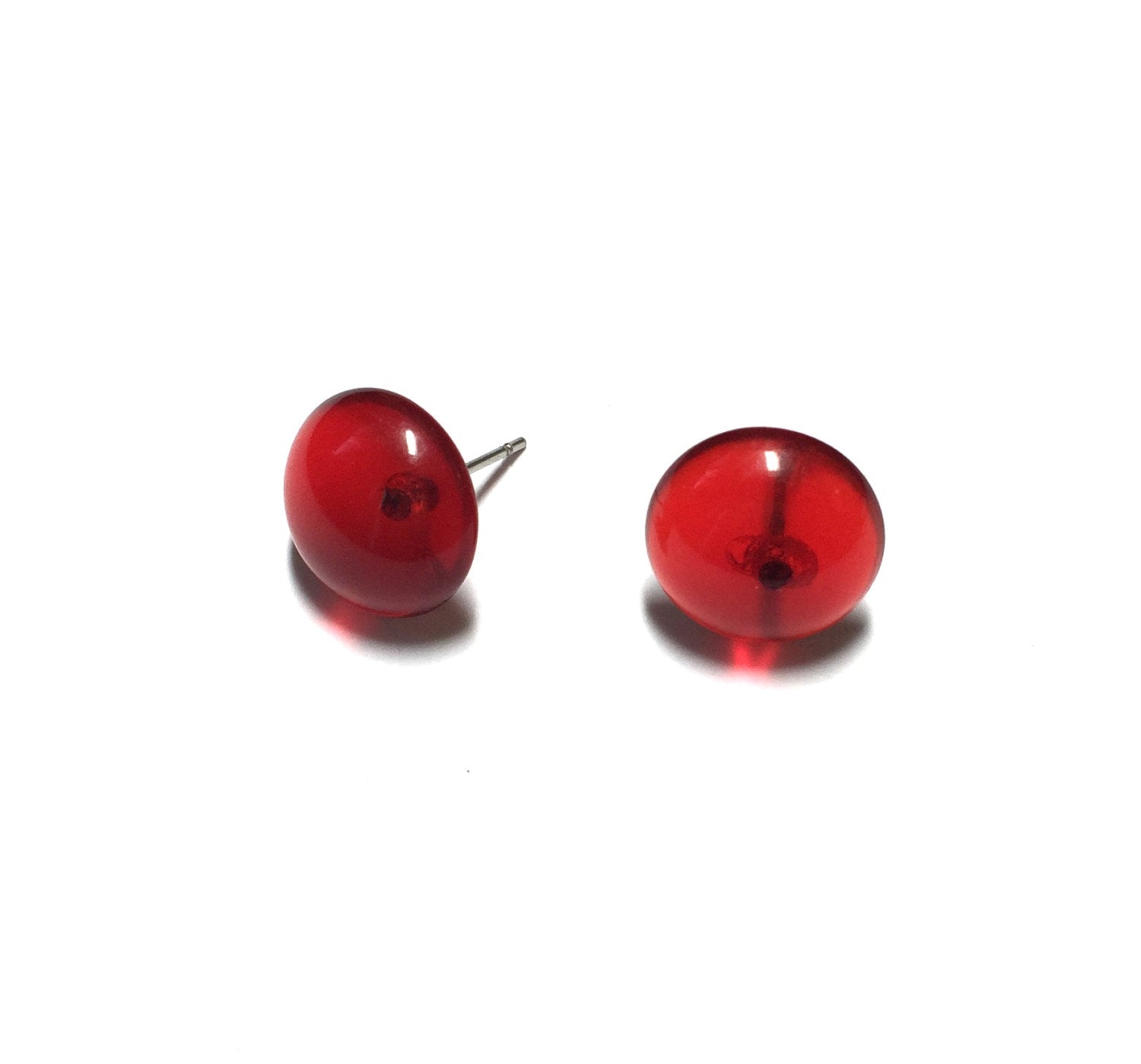red transparent studs