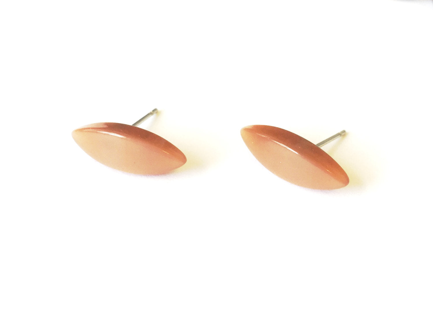 beige stud earrings