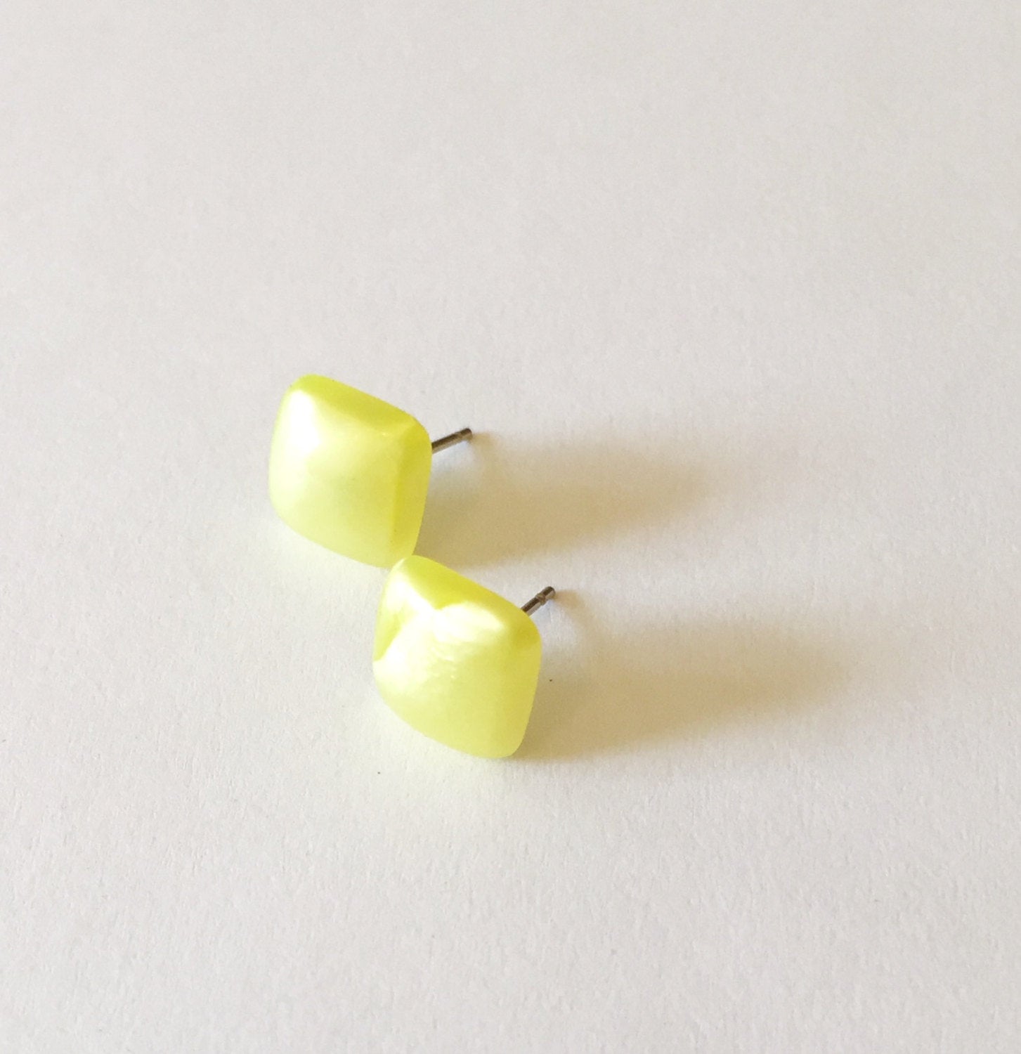 square studs yellow