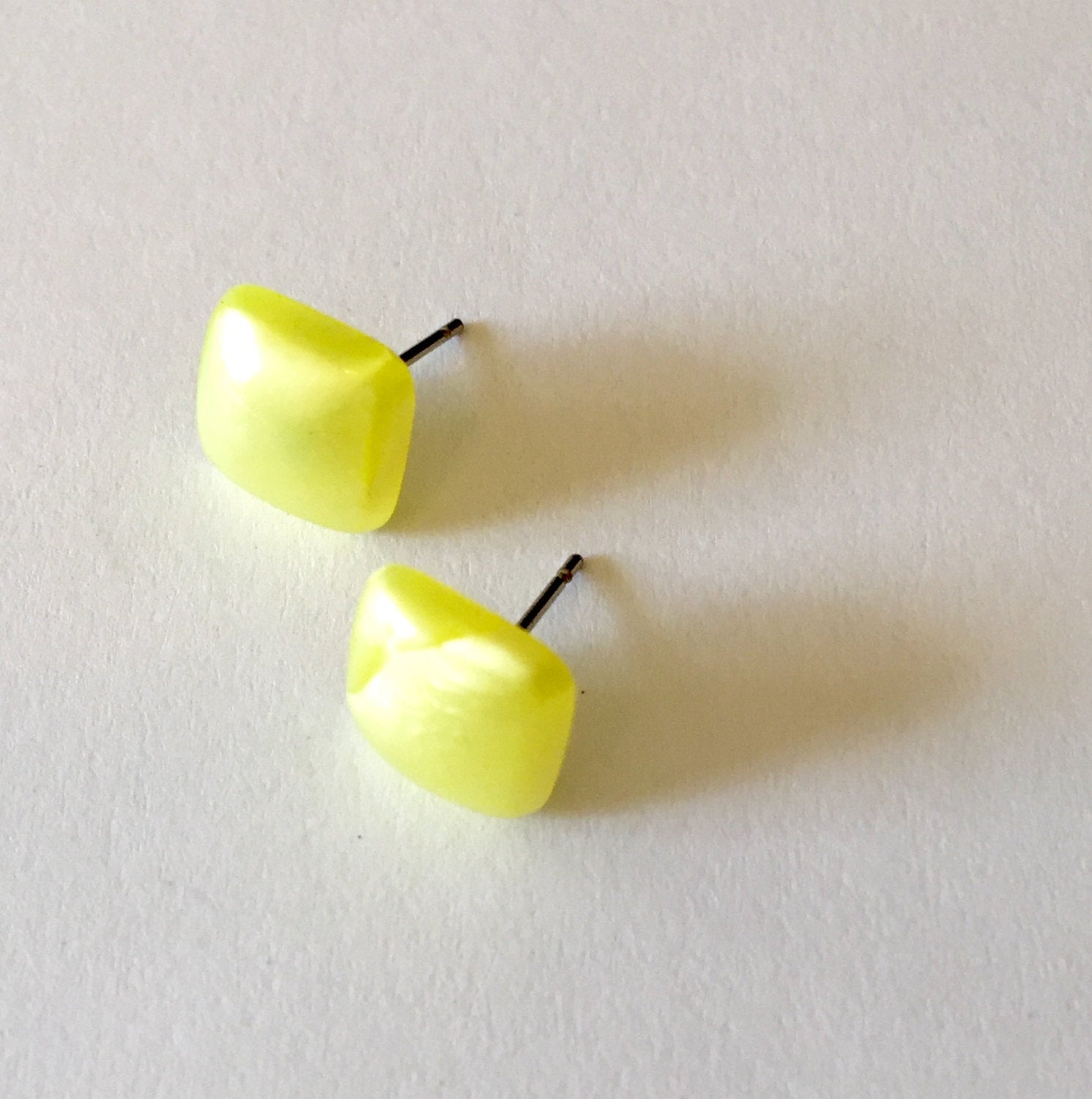 square yellow studs