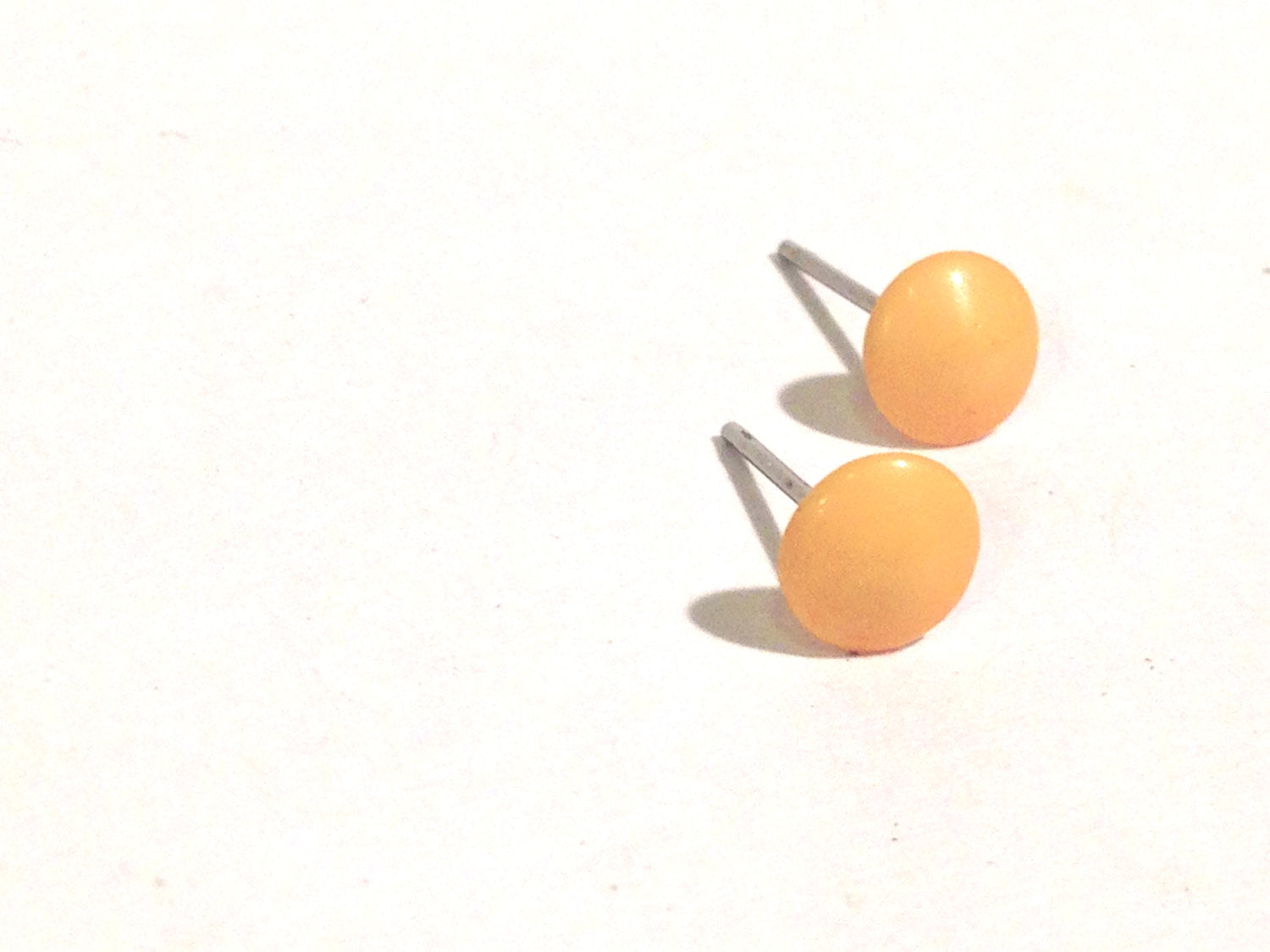 tiny yellow lucite studs