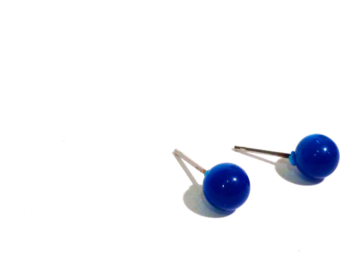 tiny blue studs