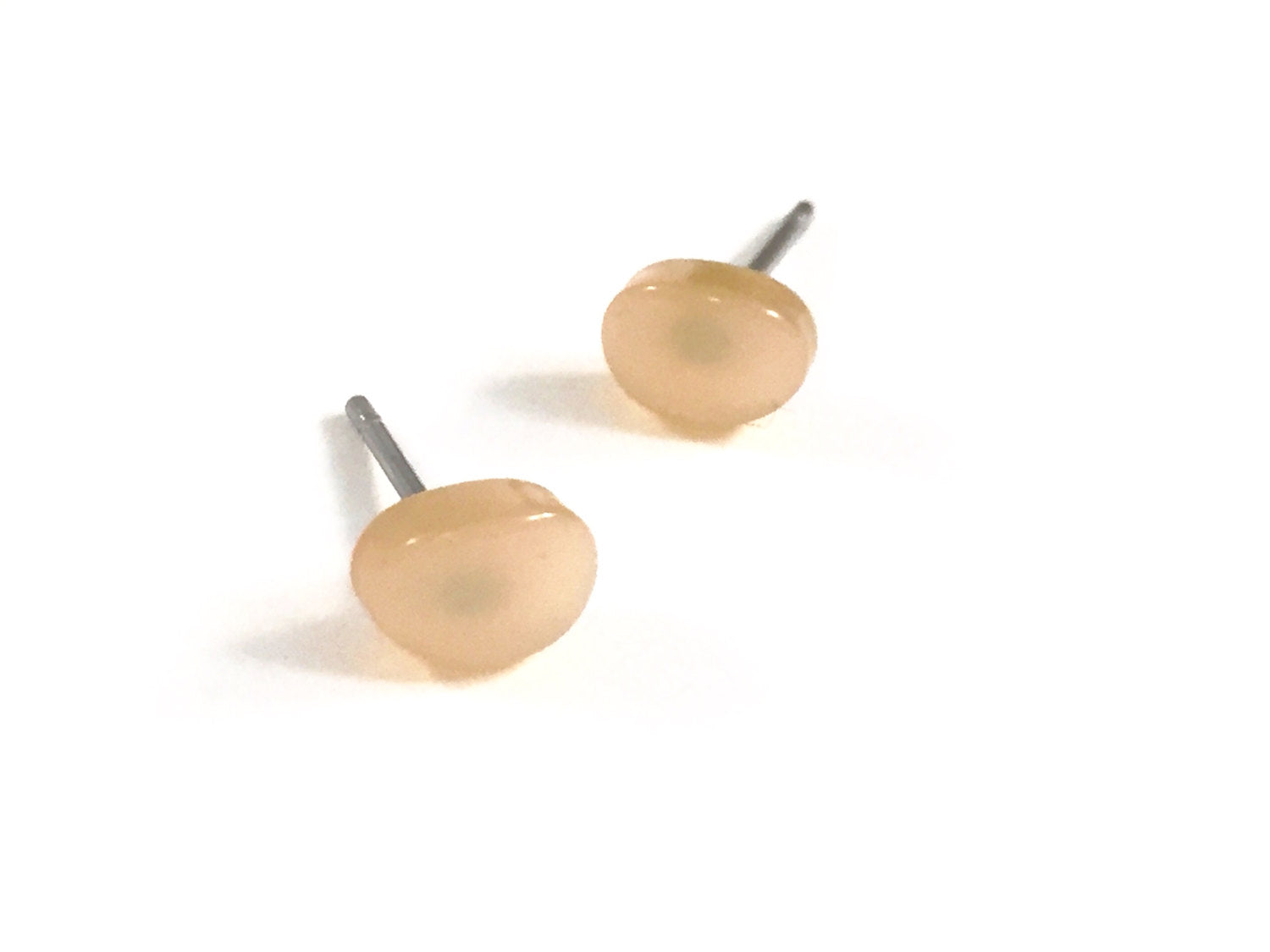 small beige studs