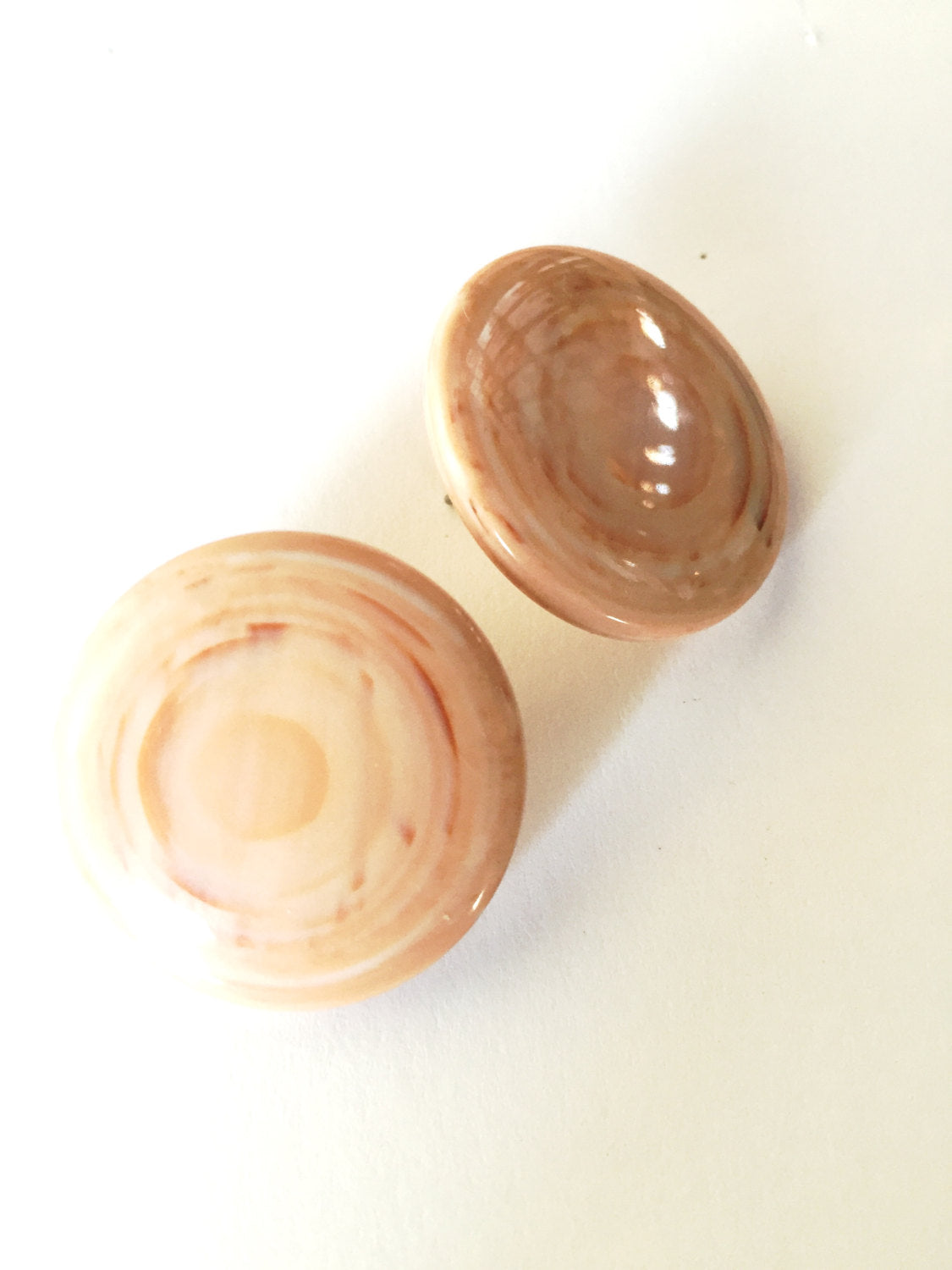 beige stud earrings