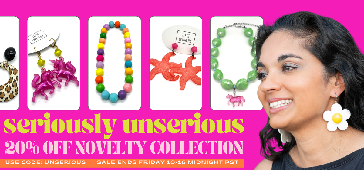 PROMOTIONAL IMAGE FOR SERIOUSLY UNSERIOUS JEWELRY COLLECTION 20% OFF WITH IMAGE OF WOMAN WEARING LARGER FLORAL EARRINGS AND PHOTOS OF NECKLACES AND EARRINGS IN BRIGHT COLORS
