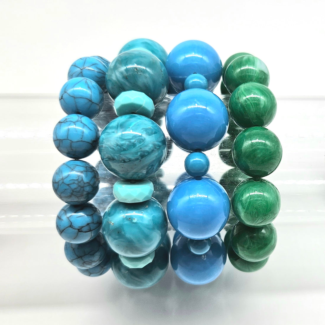 Multicolored beadeds bracelet on a white background